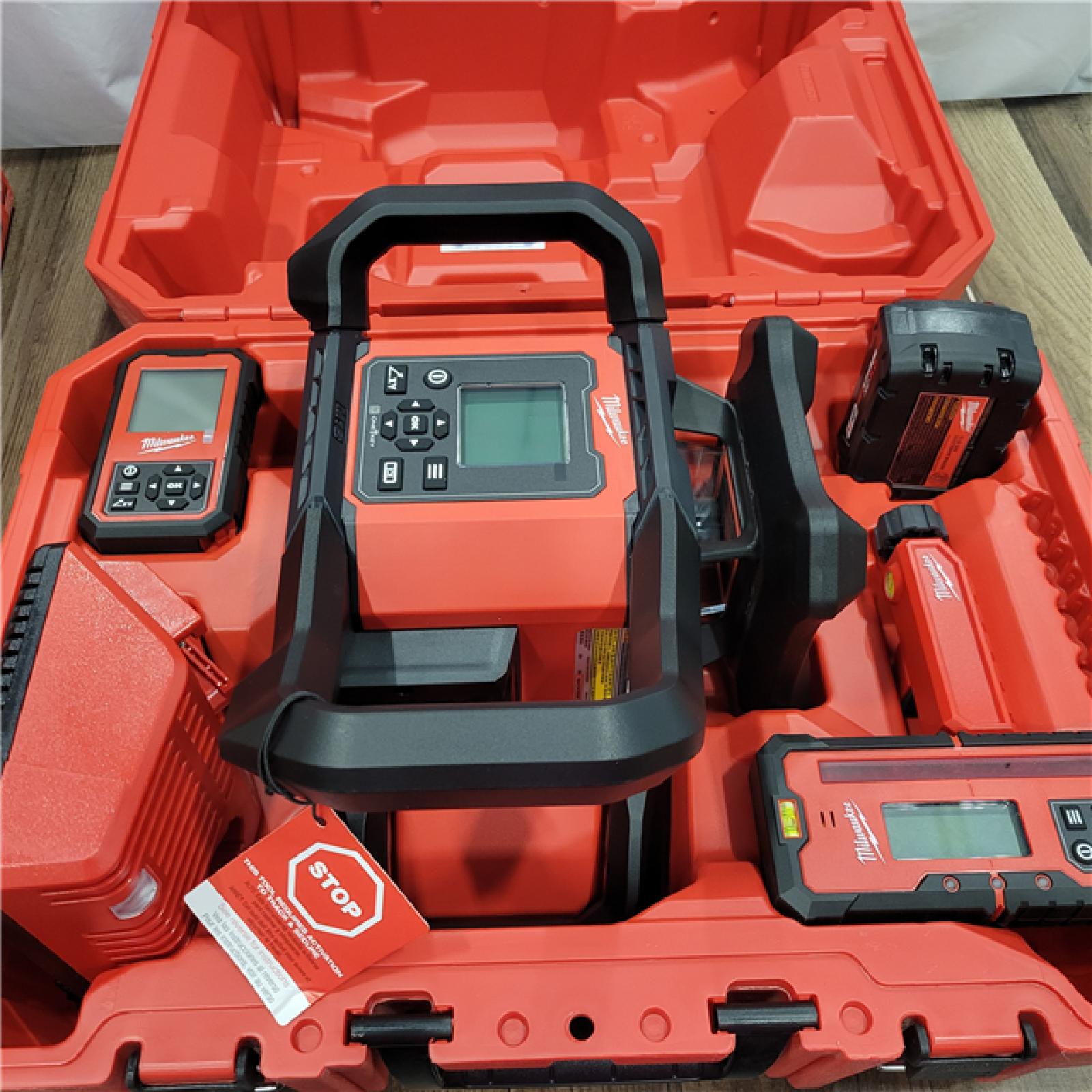 AS-IS MILWAUKEE  M18 4000 Ft. Red Exterior Dual Slope Rotary Laser Level Kit with Receiver and Remote