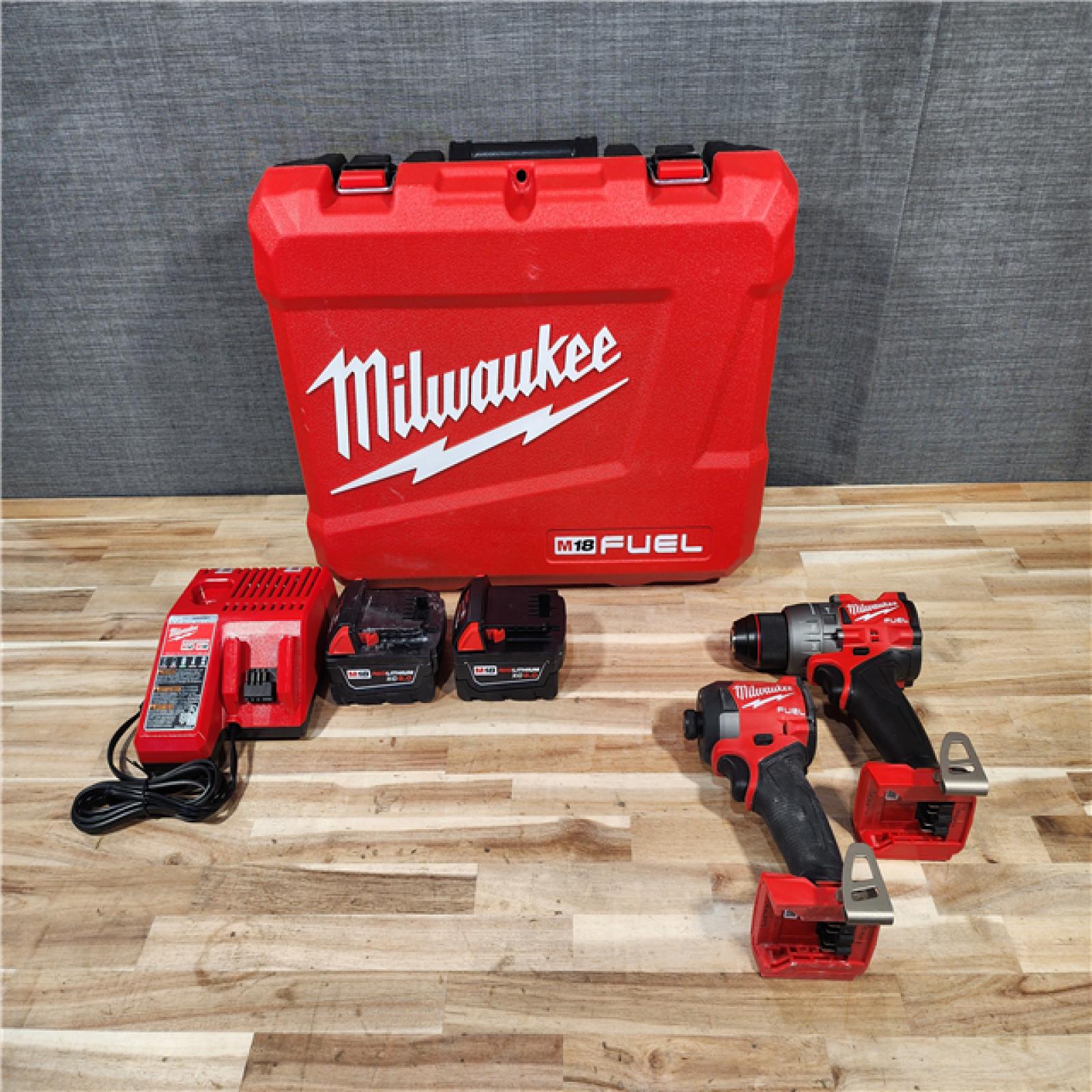 HOUSTON LOCATION - AS-IS Milwaukee  FUEL 18V Lithium-Ion Brushless Cordless Hammer Drill and Impact Driver Combo Kit