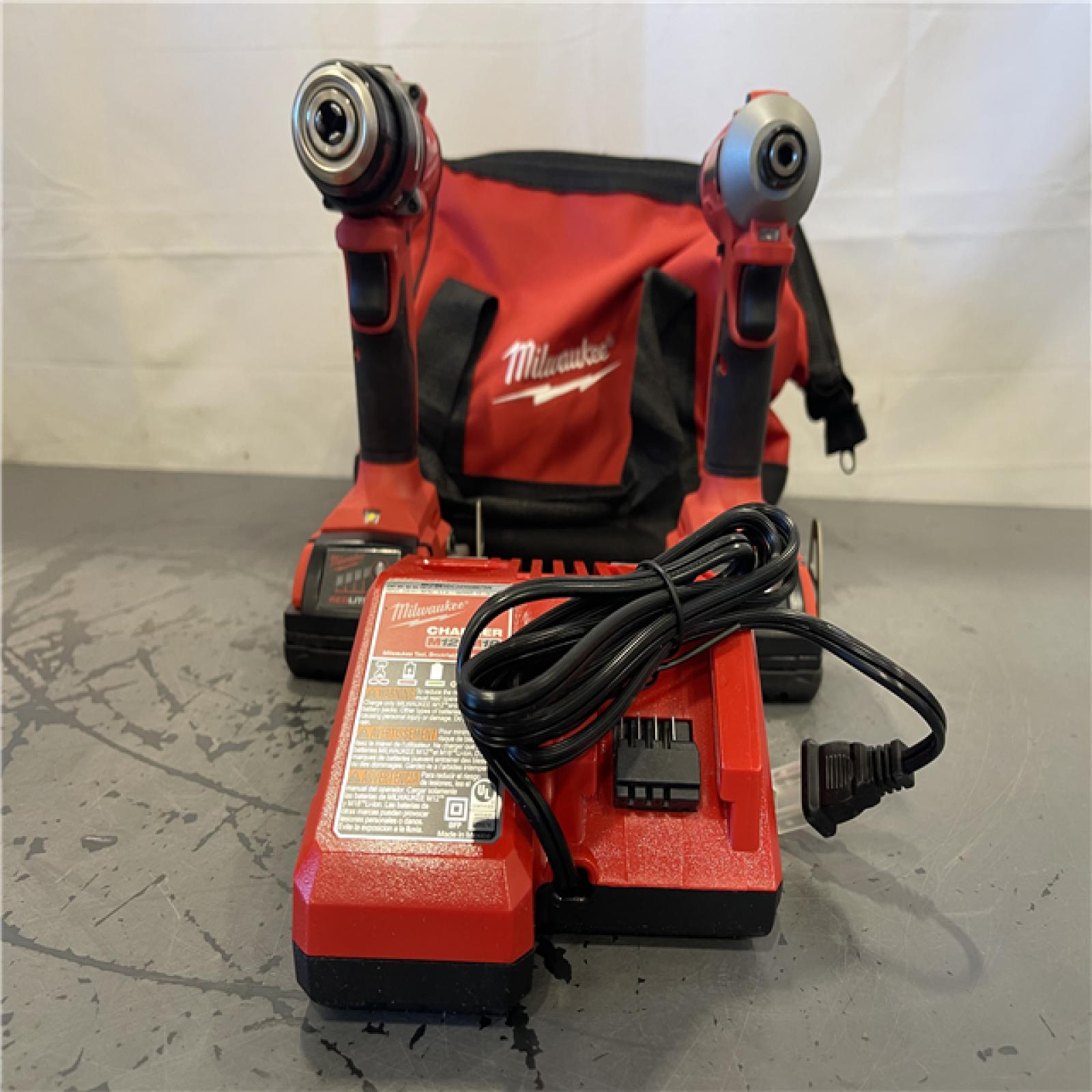AS-IS- Milwaukee M18 18V Lithium-Ion Brushless Cordless Compact Drill/Impact Combo Kit (2-Tool) W/(2) 2.0 Ah Batteries  Charger & Bag