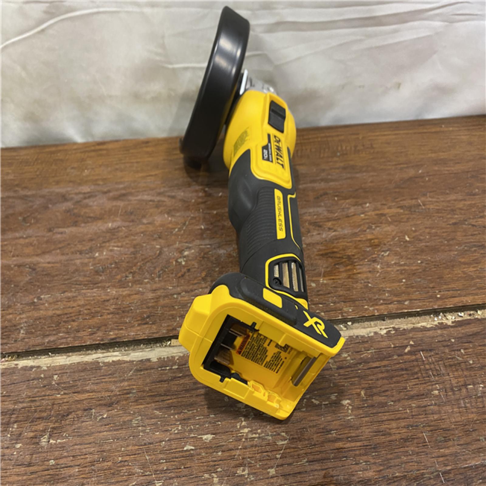 AS-IS DeWalt DCG405B 20V Max XR 4.5-Inch Slide Switch Small Angle Grinder (Tool Only)