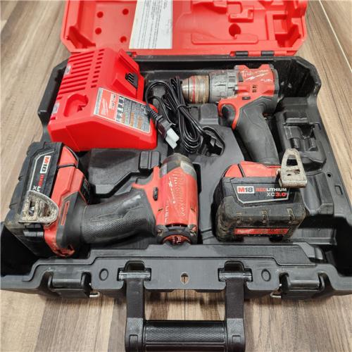 AS-IS MILWAUKEE FUEL 18V Lithium-Ion Brushless Cordless Hammer Drill and Impact Driver Combo Kit (2-Tool) with 2 Batteries
