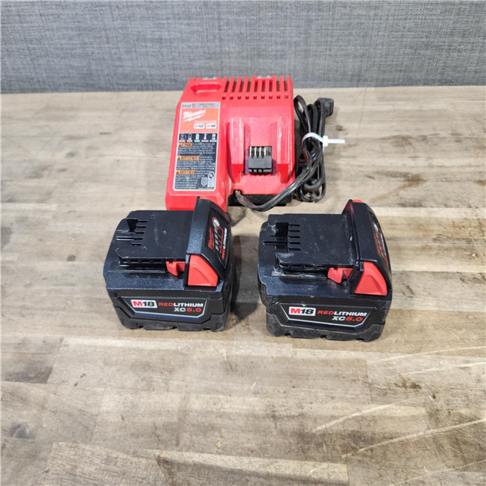 HOUSTON LOCATION - AS-IS Milwaukee 2 Tool Combo Kit W/ (2) Battery & Charger