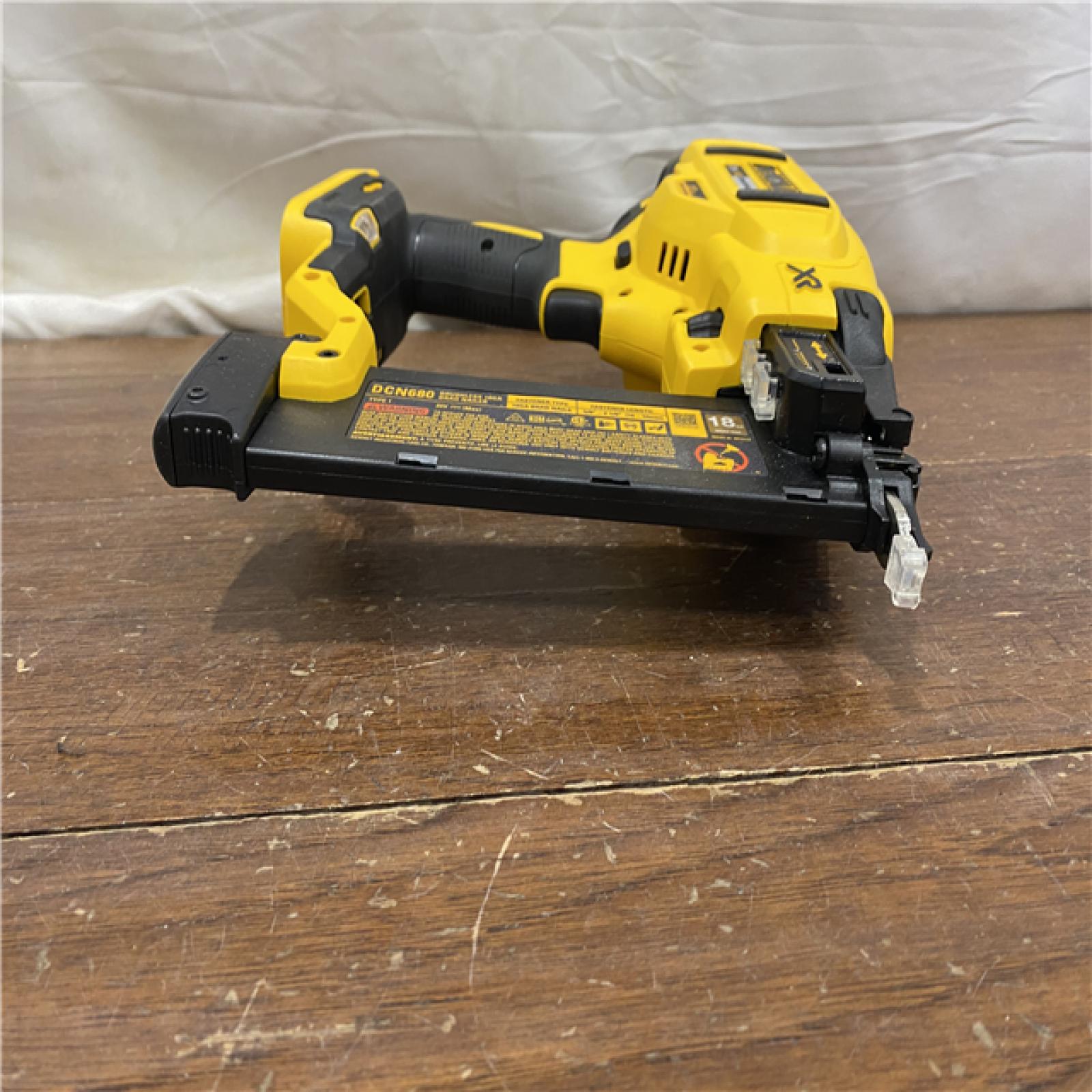 AS-IS DeWalt 20V MAX XR Lithium-Ion Electric Cordless 18-Gauge Brad Nailer (Tool Only)