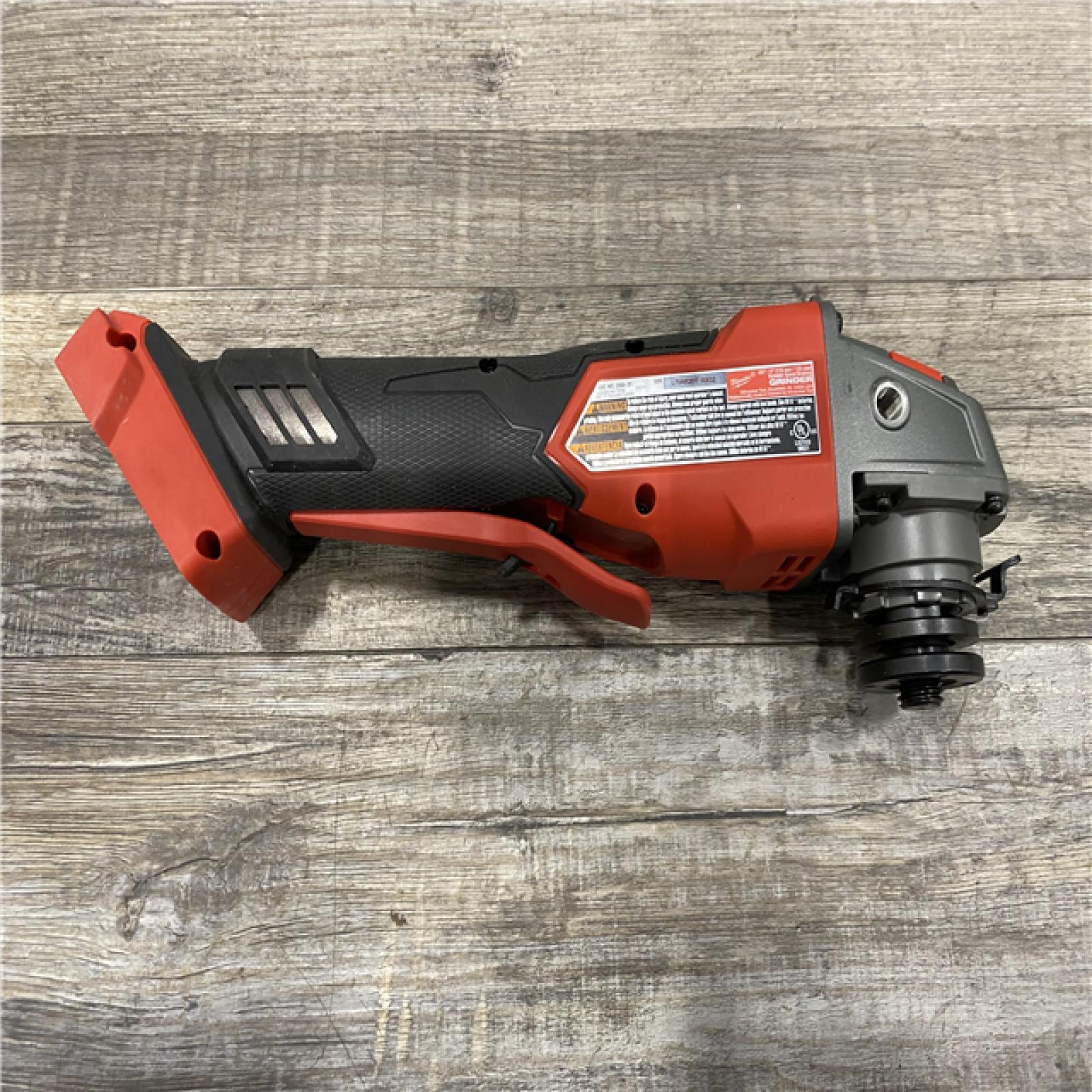 AS-IS Milwaukee FUEL 18V Lithium-Ion Brushless Cordless 4-1/2 in./5 in. Grinder with Variable Speed & Paddle Switch (Tool-Only)