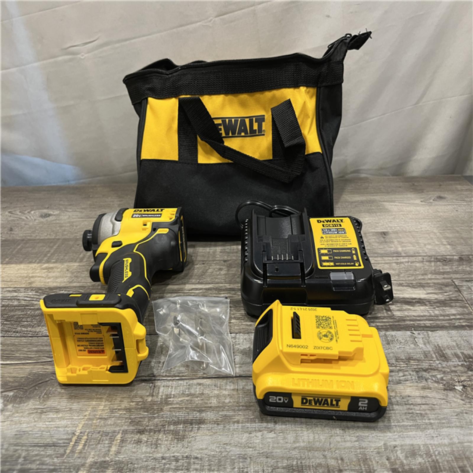 AS-IS DEWALT Atomic 20V Max Lithium-Ion Brushless Cordless Compact 1/4 in. Impact Driver Kit
