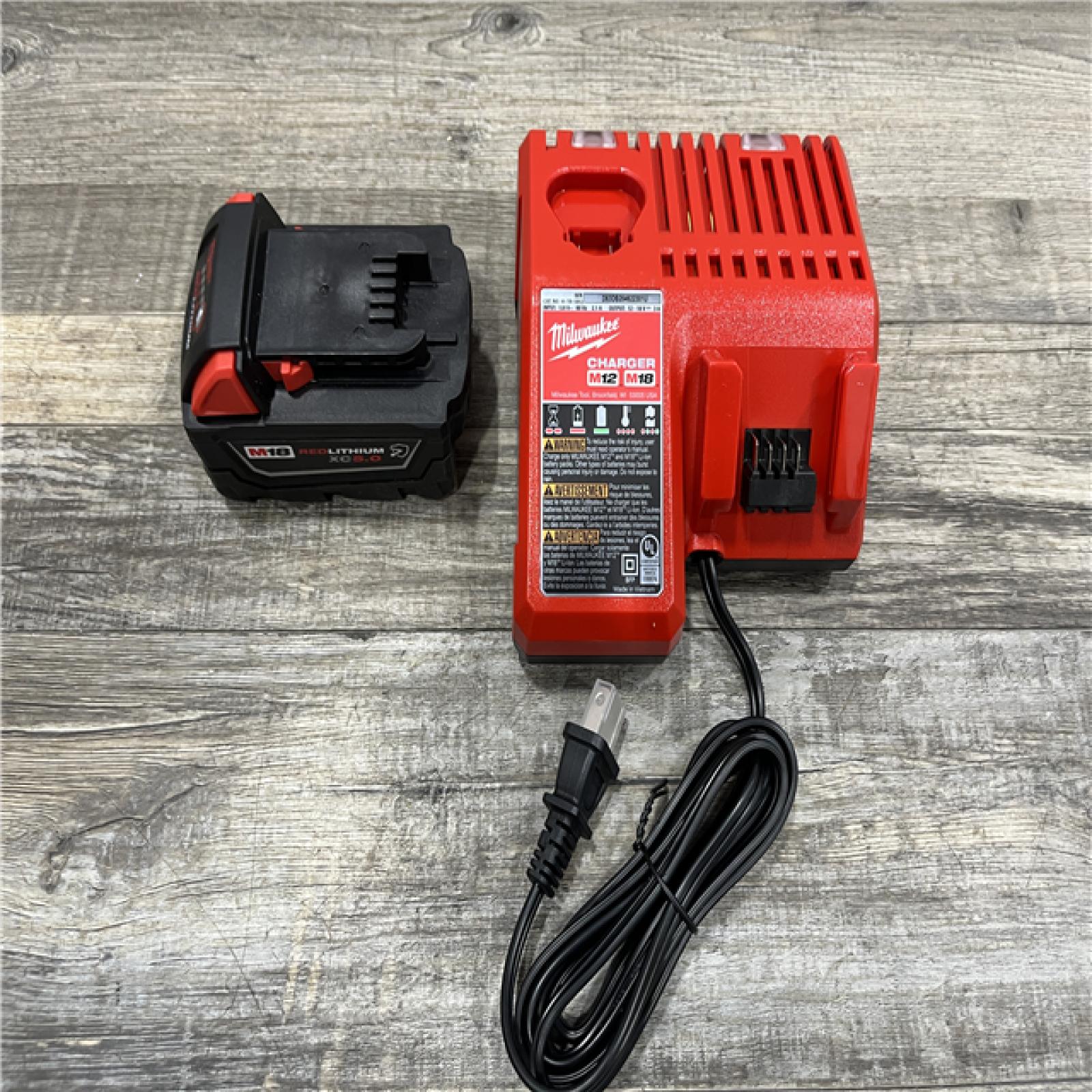 AS-IS Milwaukee 18-Volt Lithium-Ion XC Starter Kit with One 5.0Ah Battery and Charger