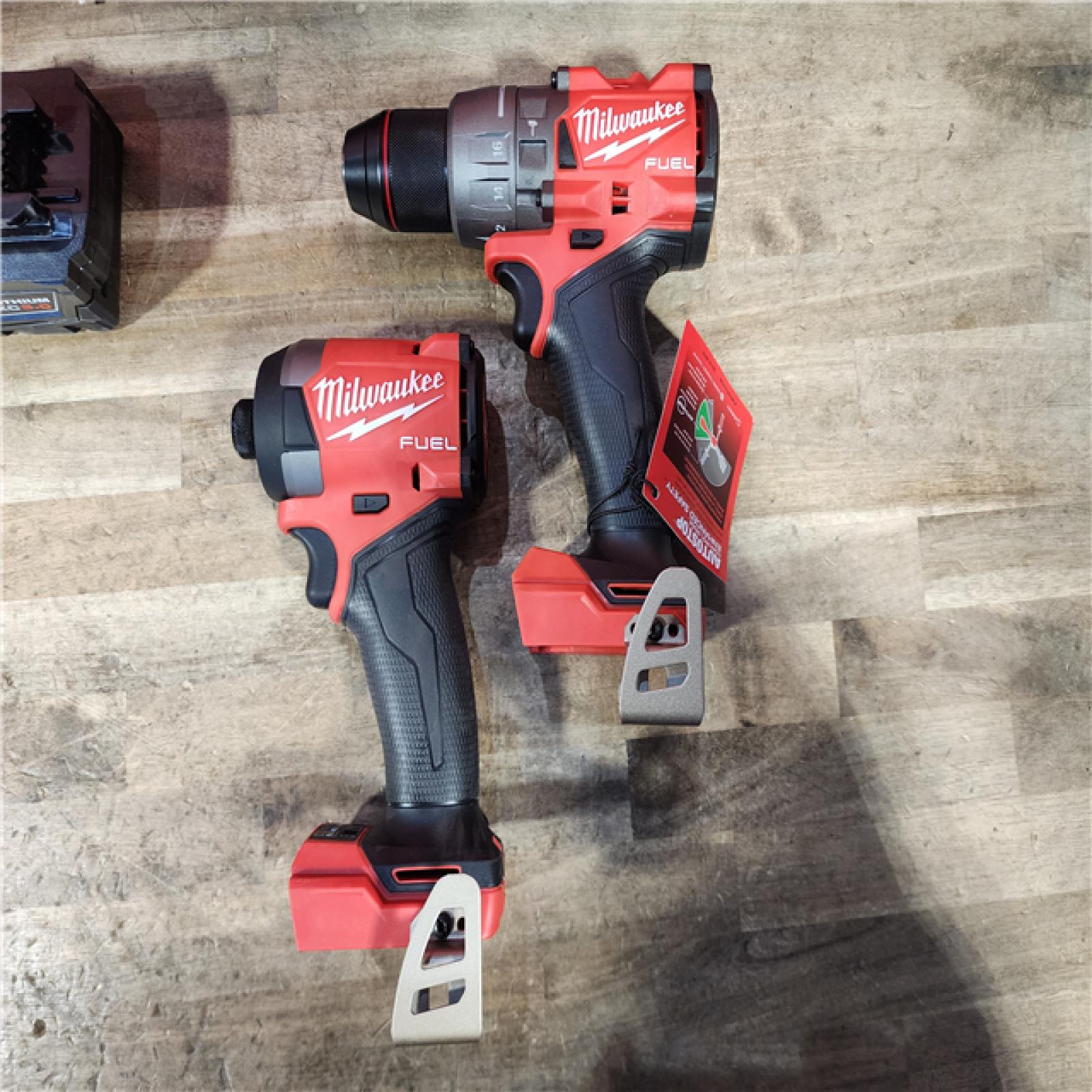 HOUSTON LOCATION - AS-IS Milwaukee FUEL 18V Lithium-Ion Brushless Cordless Hammer Drill and Impact Driver Combo Kit