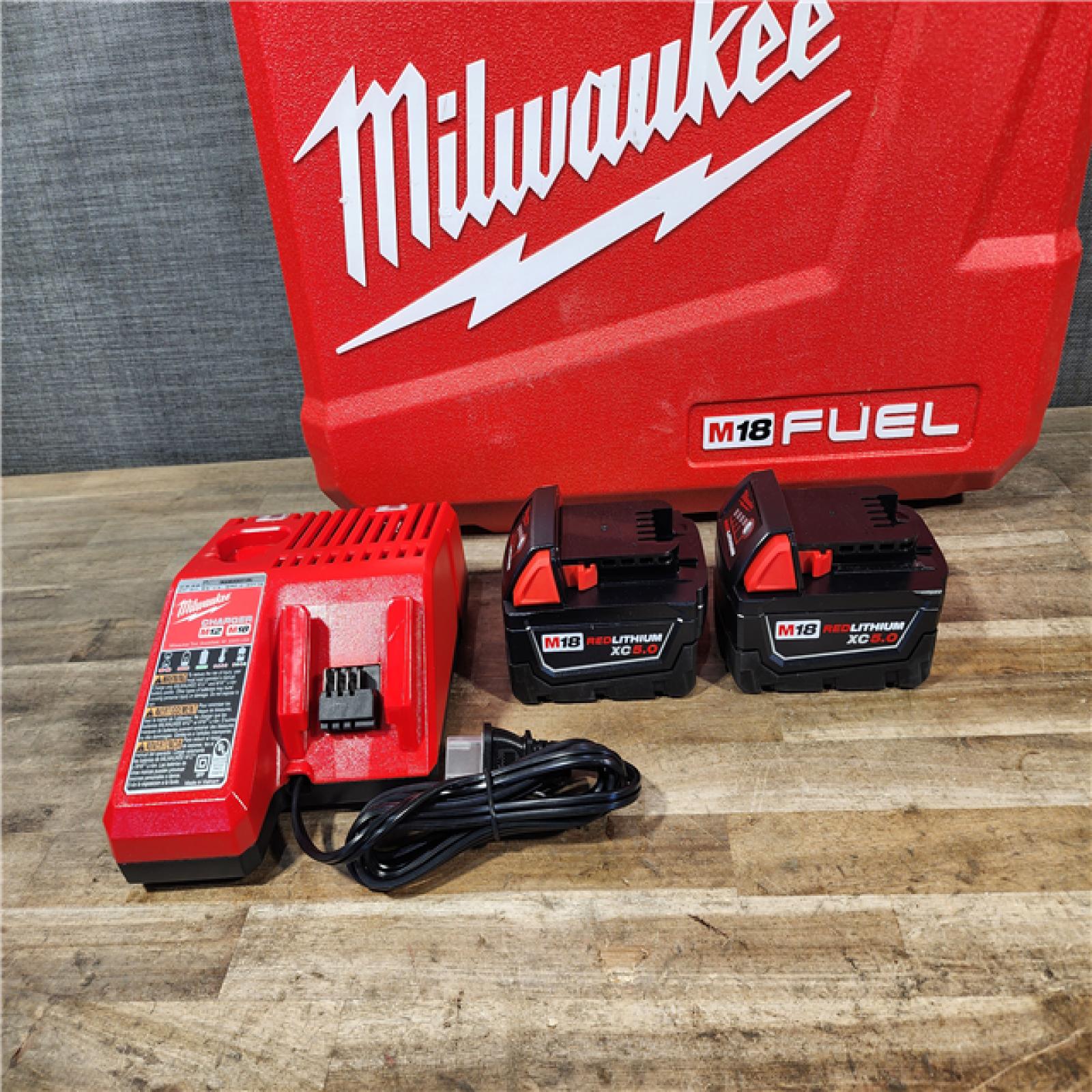 HOUSTON LOCATION - AS-IS Milwaukee FUEL 18V Lithium-Ion Brushless Cordless Hammer Drill and Impact Driver Combo Kit