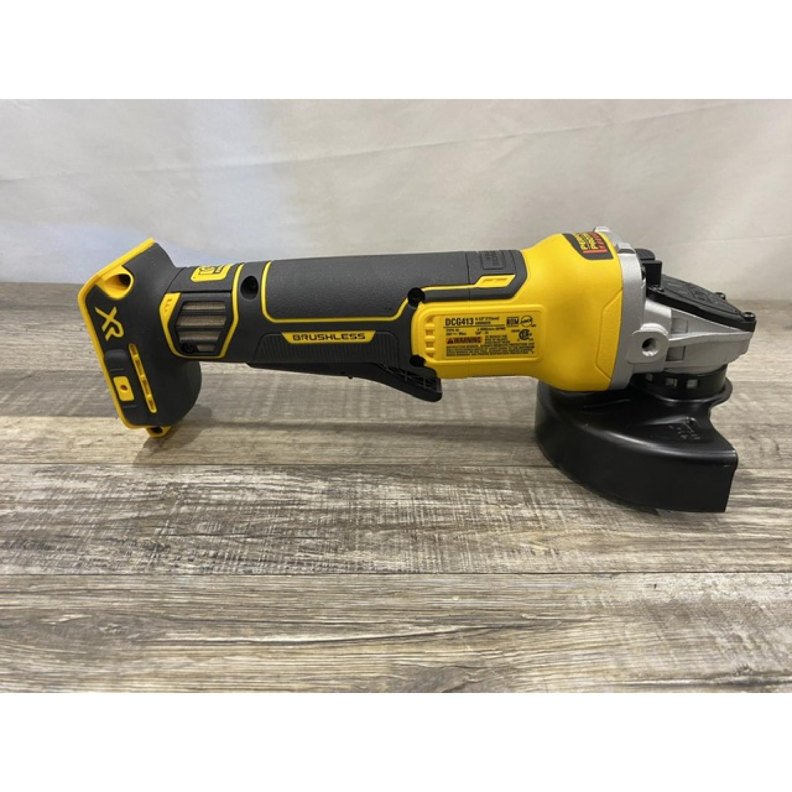 AS-IS DEWALT 20V MAX XR Cordless Brushless 4.5 in. Paddle Switch Small Angle Grinder with Kickback Brake (Tool Only)