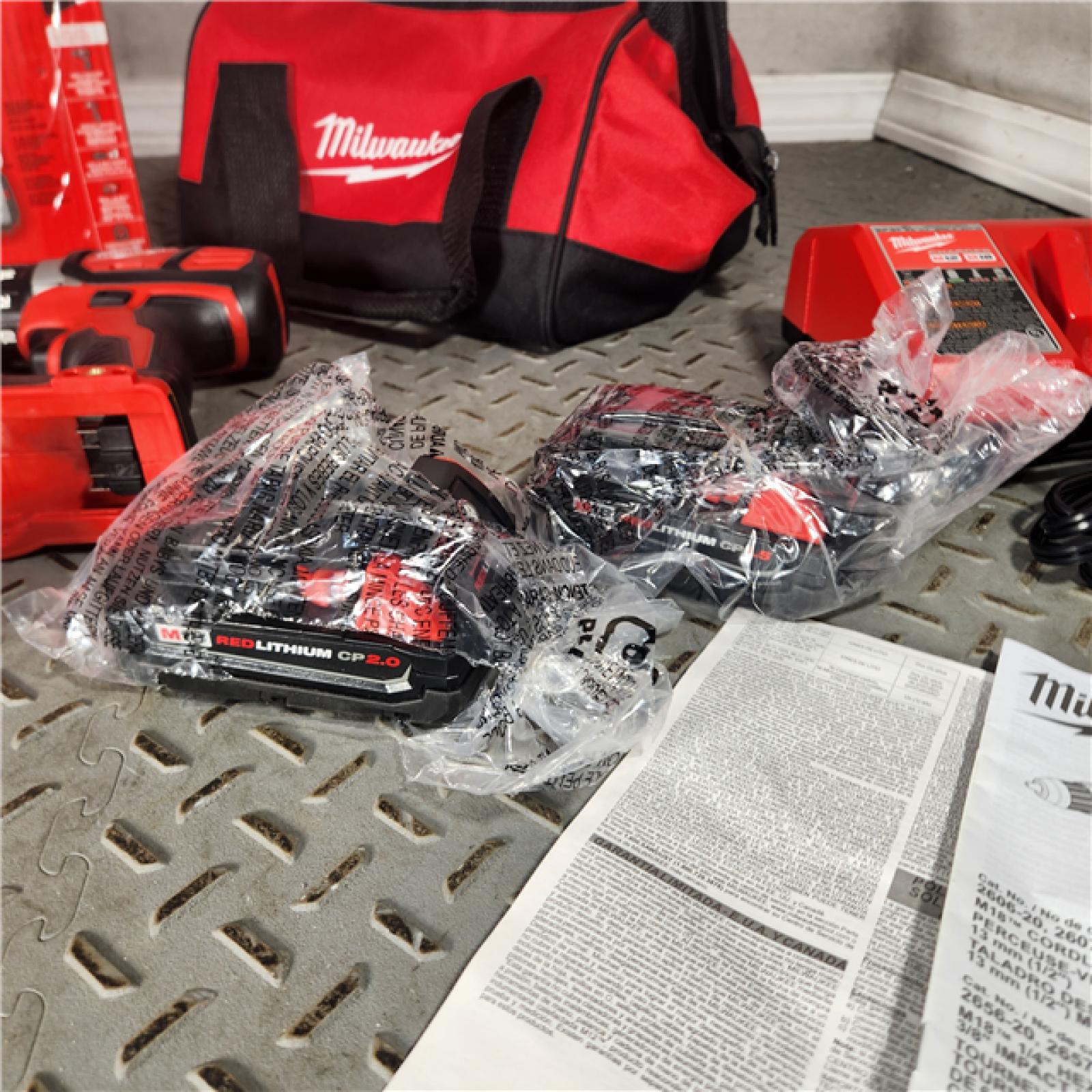 Houston Location - As-Is Milwaukee 2691-22 18V M18 Lithium-Ion Compact Brushless Cordless 2-Tool Combo Kit with 1/2 Drill/Driver and 1/4 Hex Impact Driver 2.0 Ah - Appears IN GOOD Condition