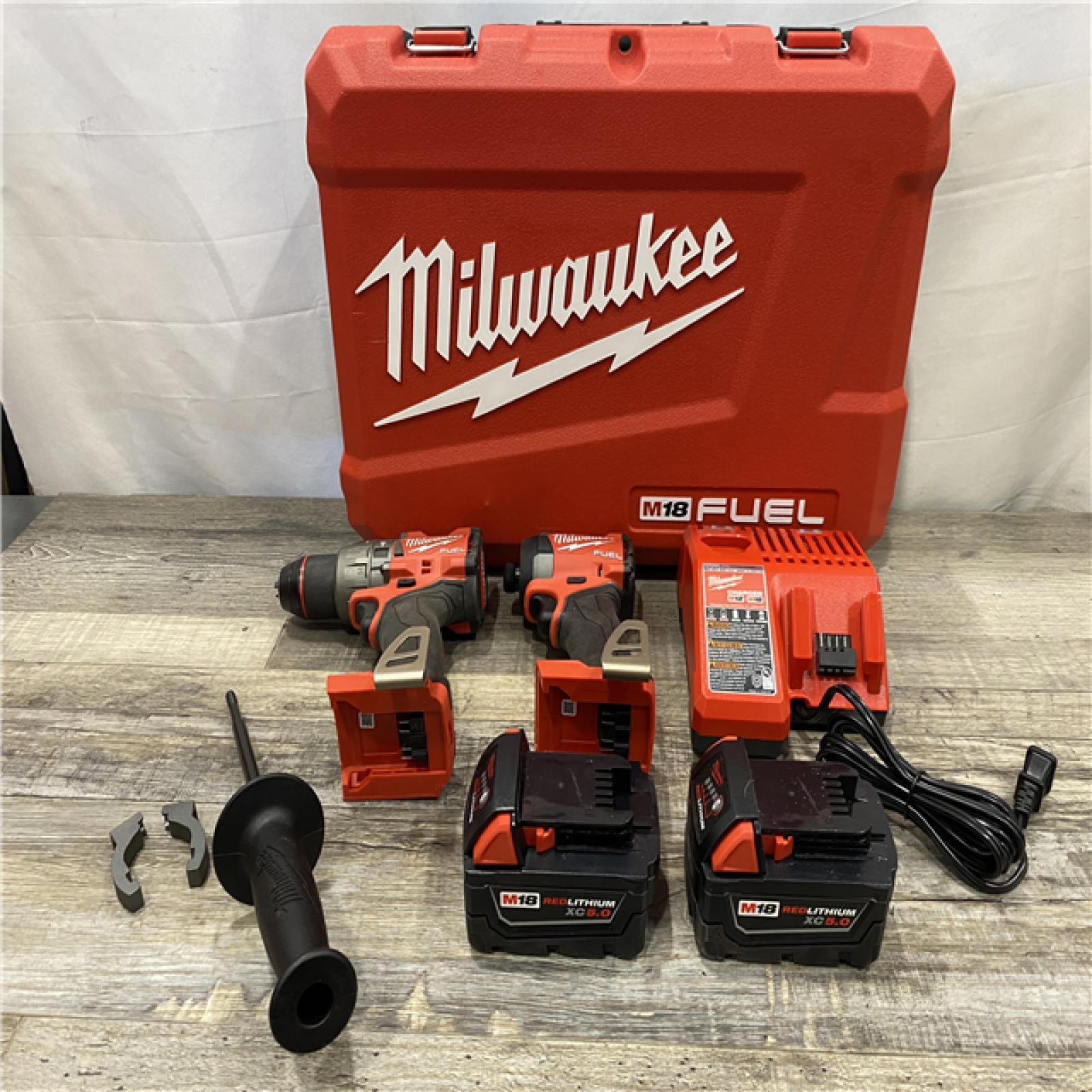 AS-IS Milwaukee FUEL 18V Lithium-Ion Brushless Cordless Hammer Drill and Impact Driver Combo Kit