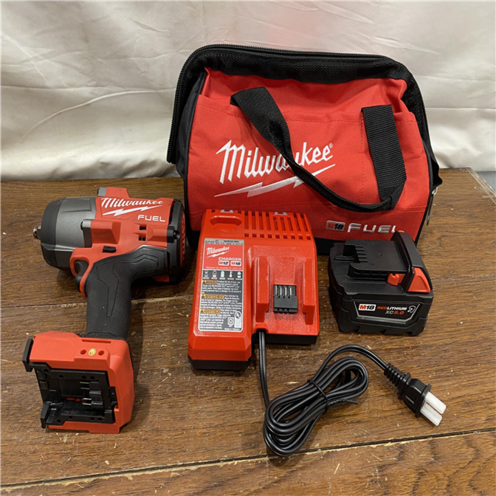 AS-IS Milwaukee M18 1/2 in. Cordless Brushless High Torque Impact Wrench Kit (Battery & Charger)