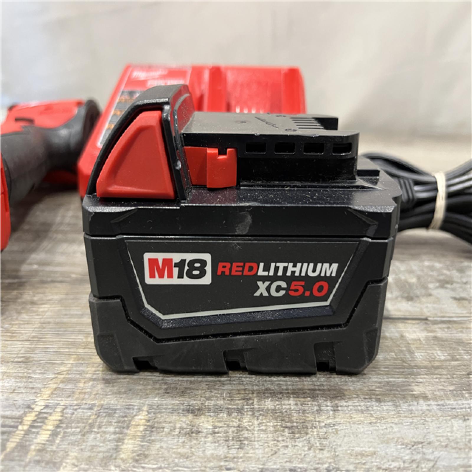 AS-IS Milwaukee 18V Lithium-Ion Compact Brushless Cordless 1/4 in. Impact Driver Kit