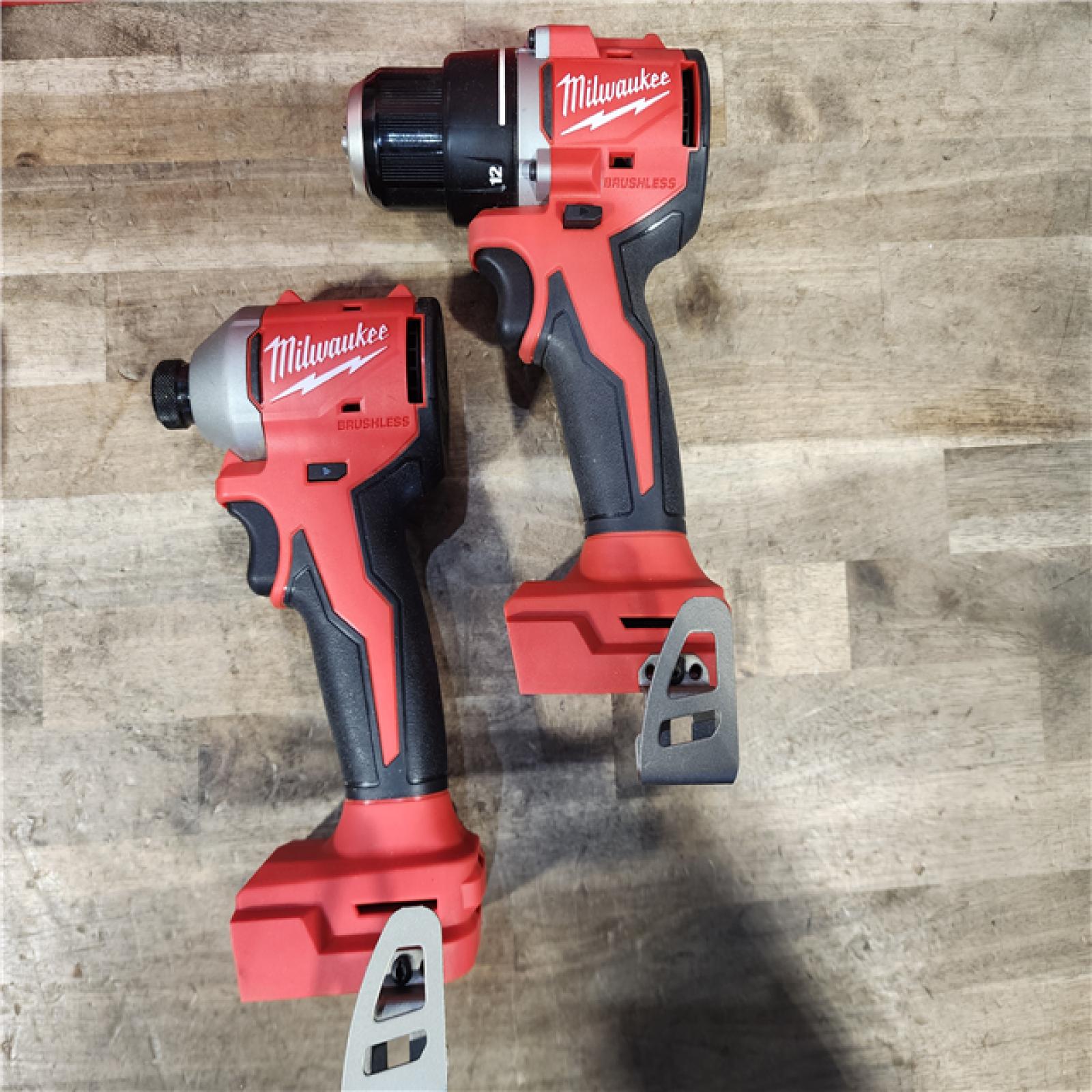 HOUSTON LOCATION - AS-IS Milwaukee M18 18V Lithium-Ion Brushless Cordless Compact Drill/Impact Combo Kit (2-Tool) W/(2) 2.0 Ah Batteries  Charger & Bag