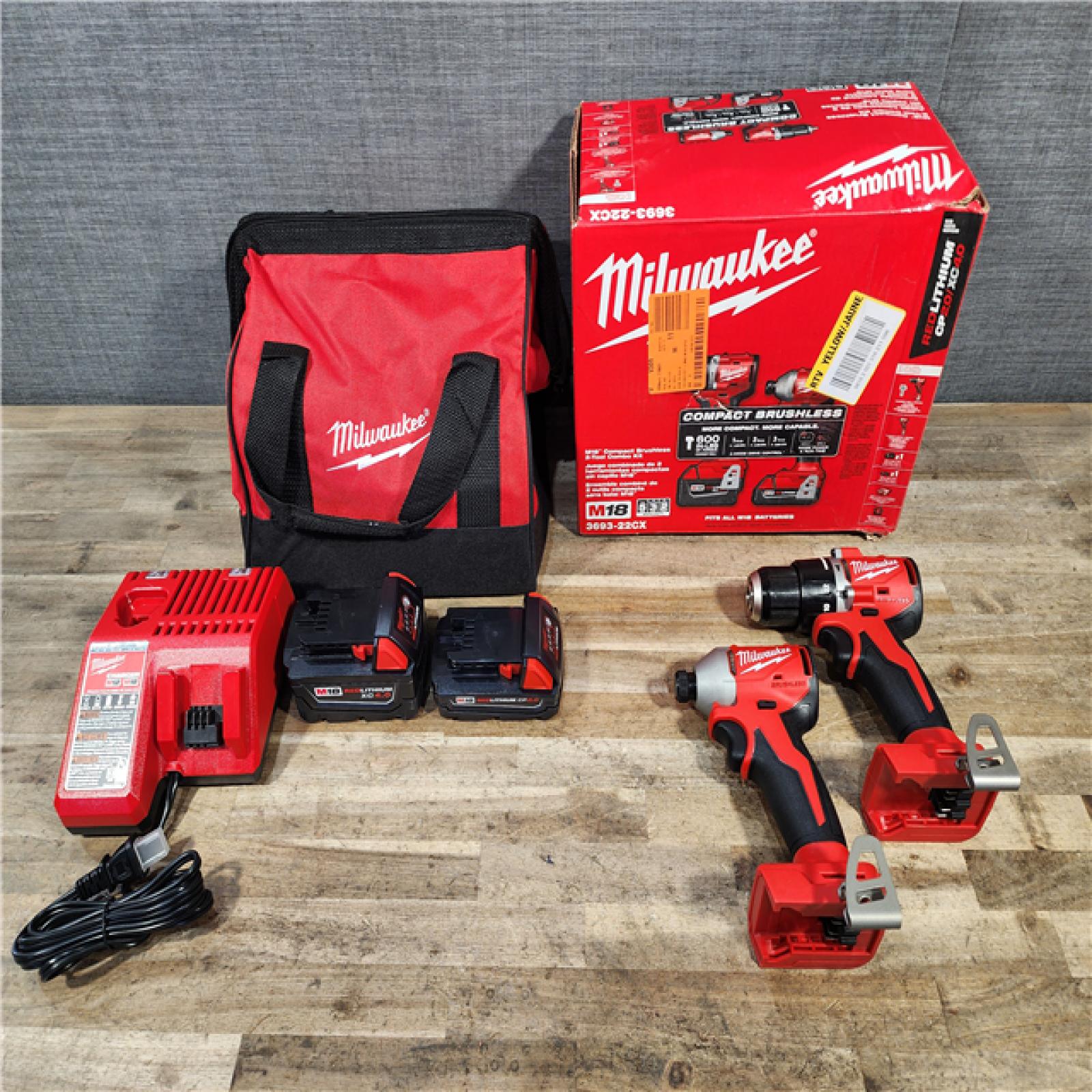 HOUSTON LOCATION - AS-IS M18 18-Volt Lithium-Ion Brushless Cordless Compact Hammer Drill/Impact Combo Kit (2-Tool) with (2) Batteries  Bag
