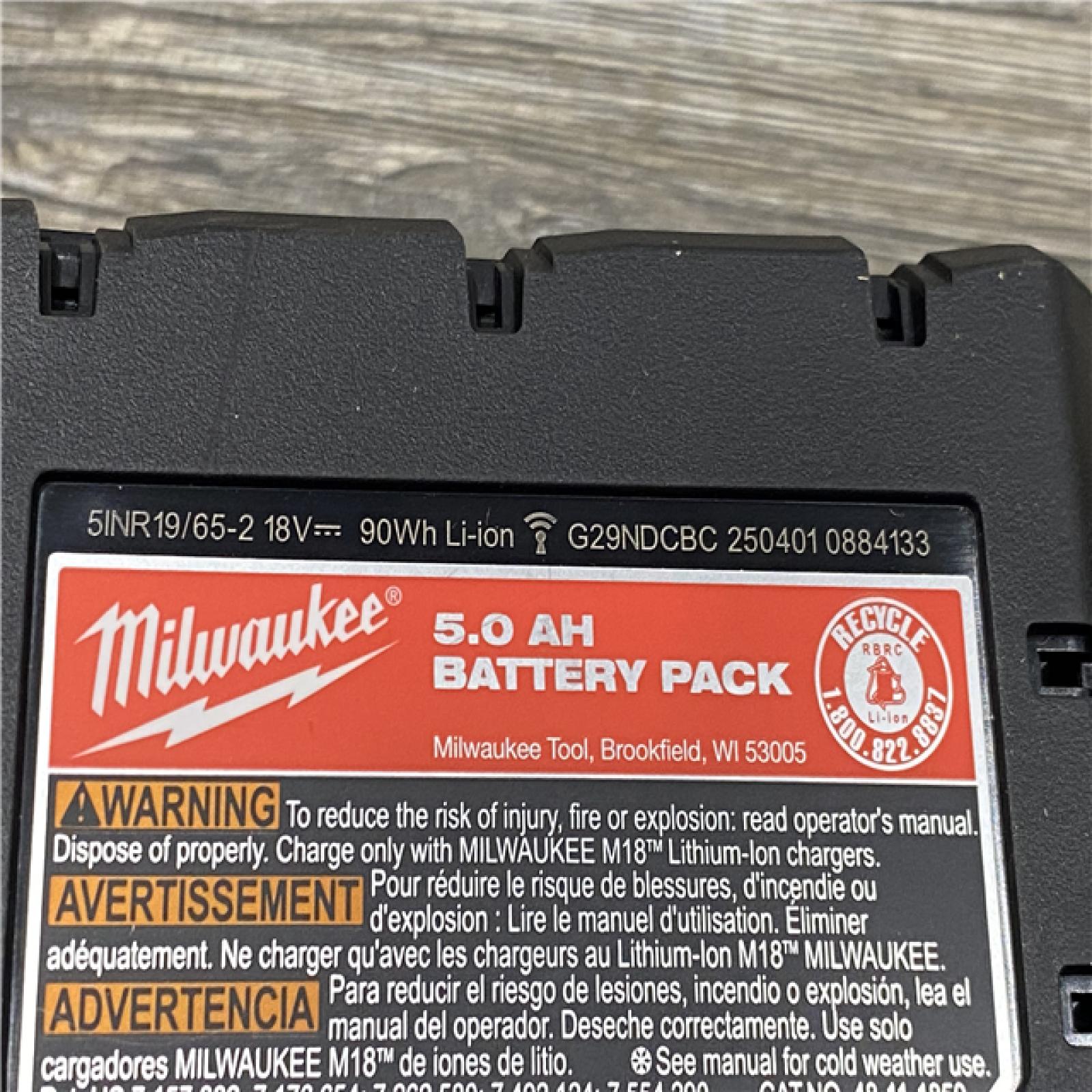 AS-IS Milwaukee 18-Volt Lithium-Ion XC Starter Kit with Two 5.0Ah Batteries and Charger