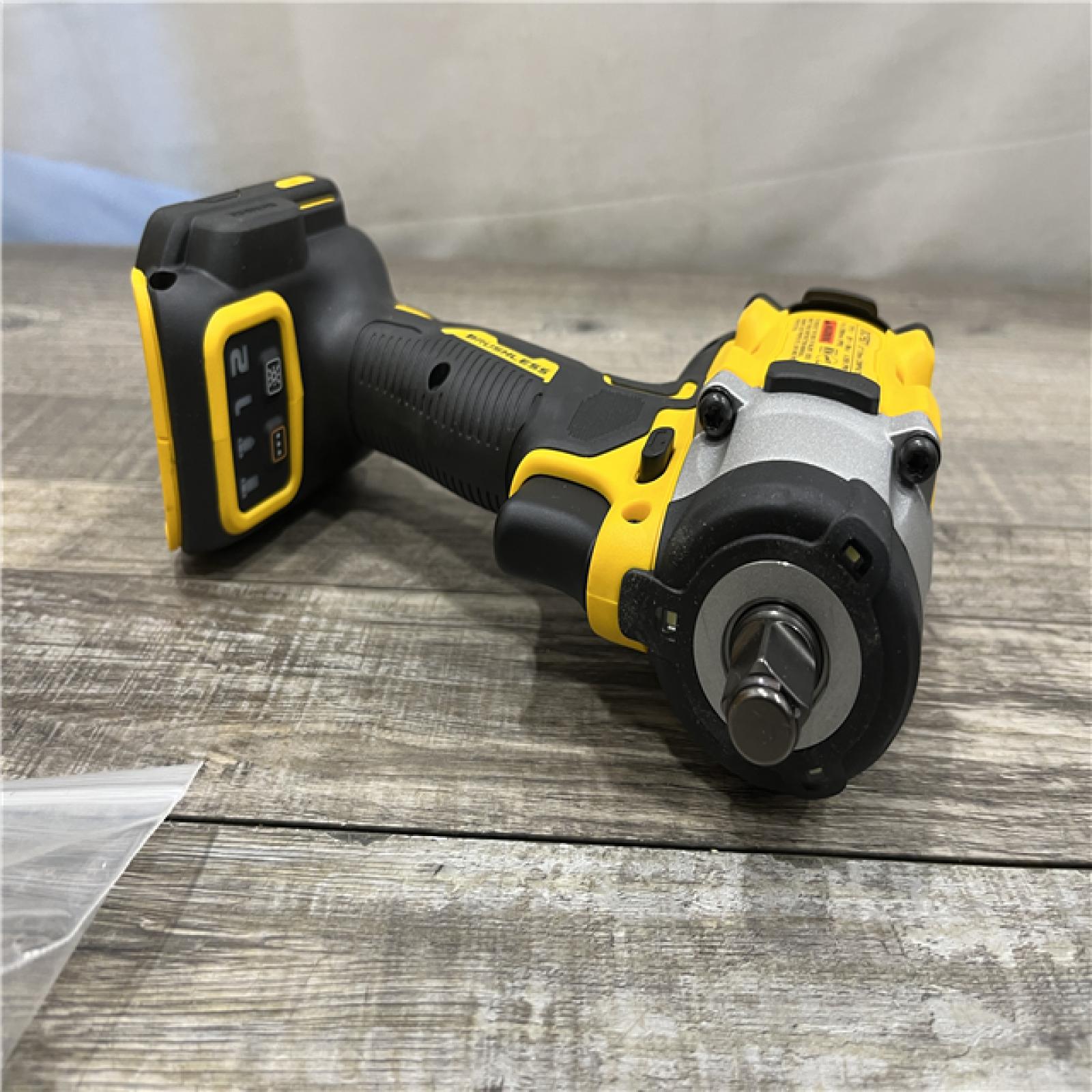 AS-IS DEWALT ATOMIC 20V MAX Cordless Brushless 1/2 in. Variable Speed Impact Wrench (Tool Only)