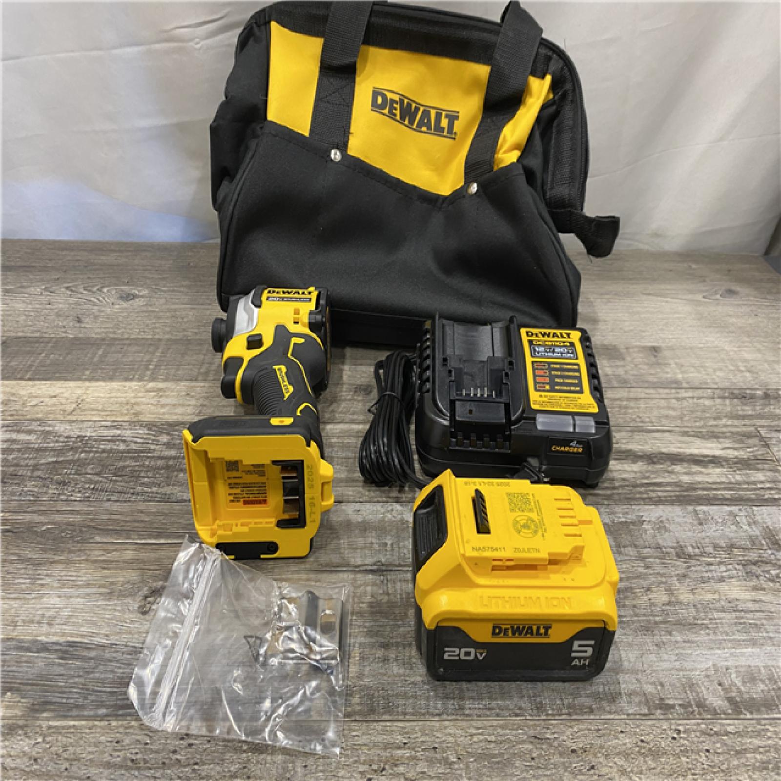 AS-IS DEWALT ATOMIC 20V MAX Lithium-Ion Cordless 1/4 in. Brushless Impact Driver Kit