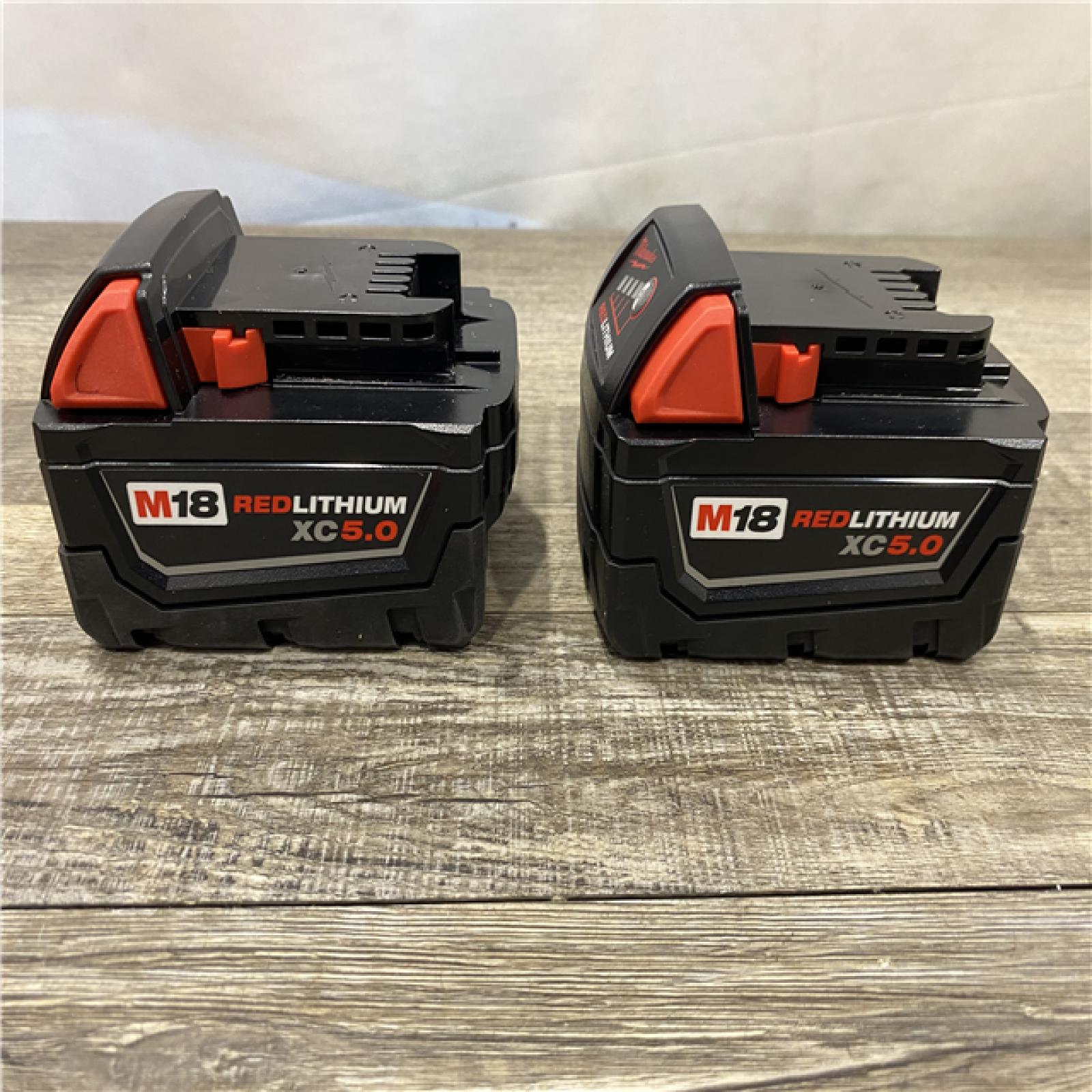 AS-IS Milwaukee 18-Volt Lithium-Ion XC Starter Kit with Two 5.0Ah Batteries and Charger