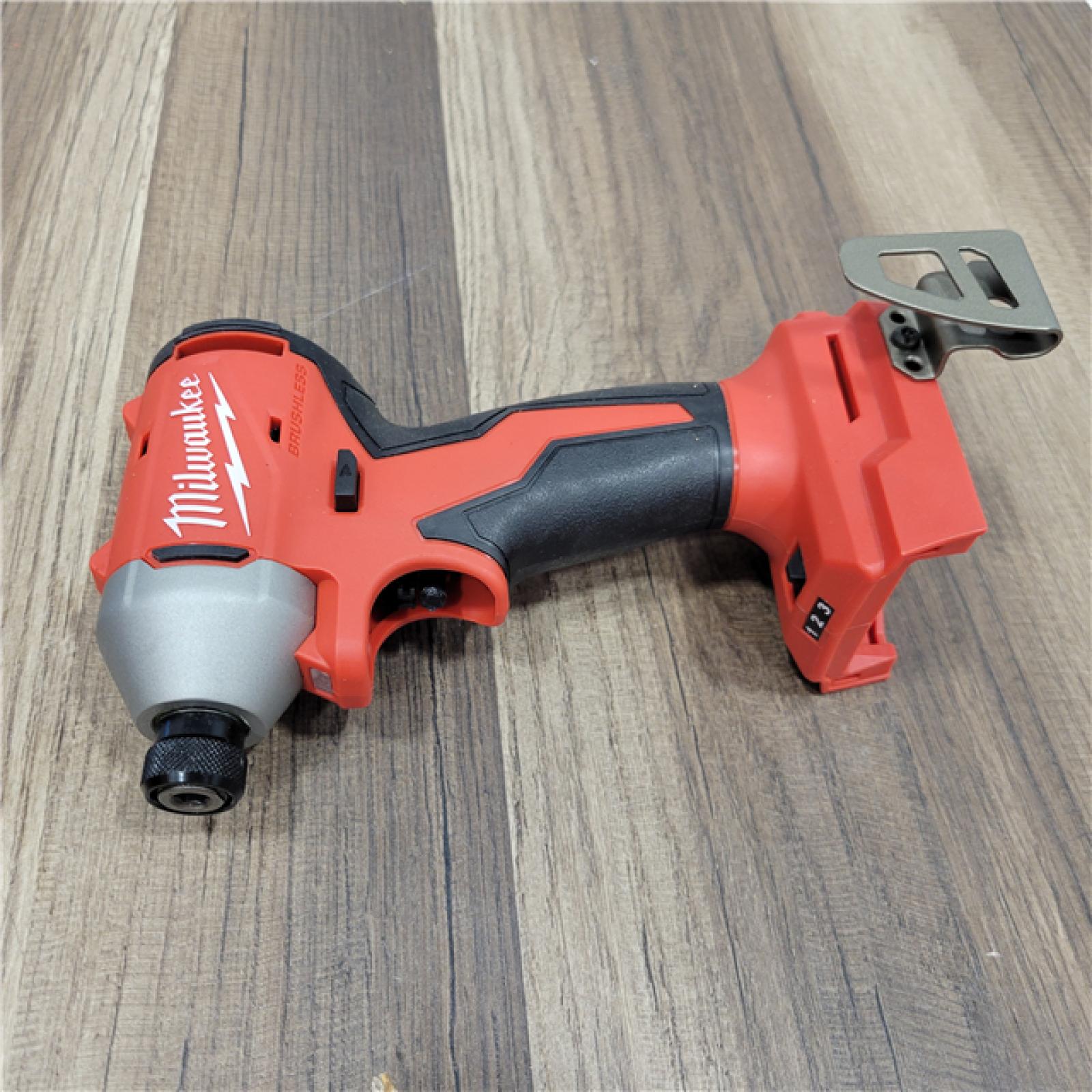 AS-IS Milwaukee M18 18-Volt Lithium-Ion Brushless Cordless Combo Kit (4-Tool) with 2-Batteries, 1-Charger and Tool Bag
