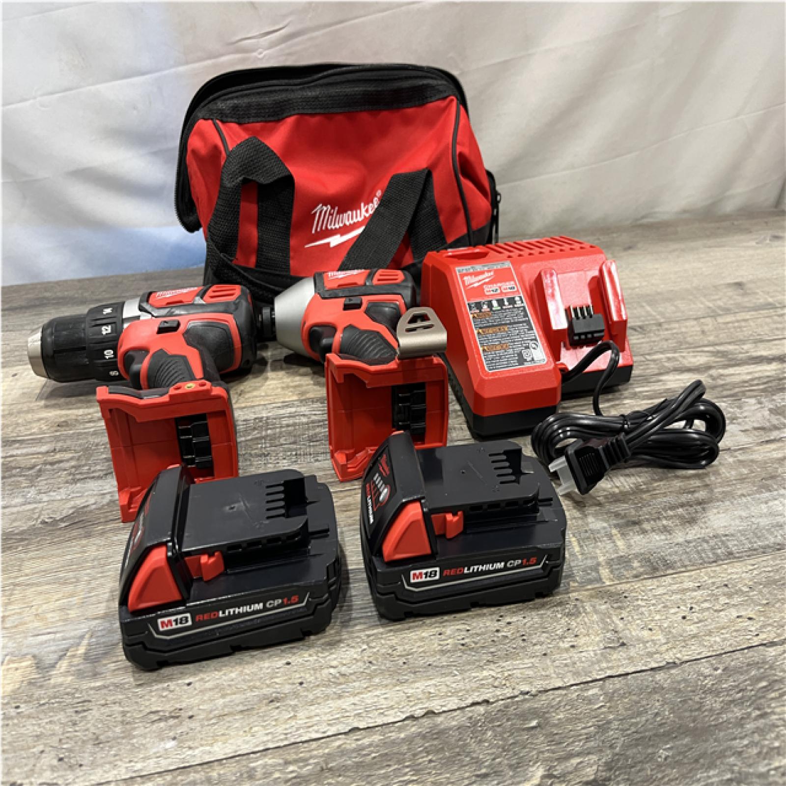 AS-IS Milwaukee 18V Lithium-Ion Cordless Drill Driver/Impact Driver Combo Kit