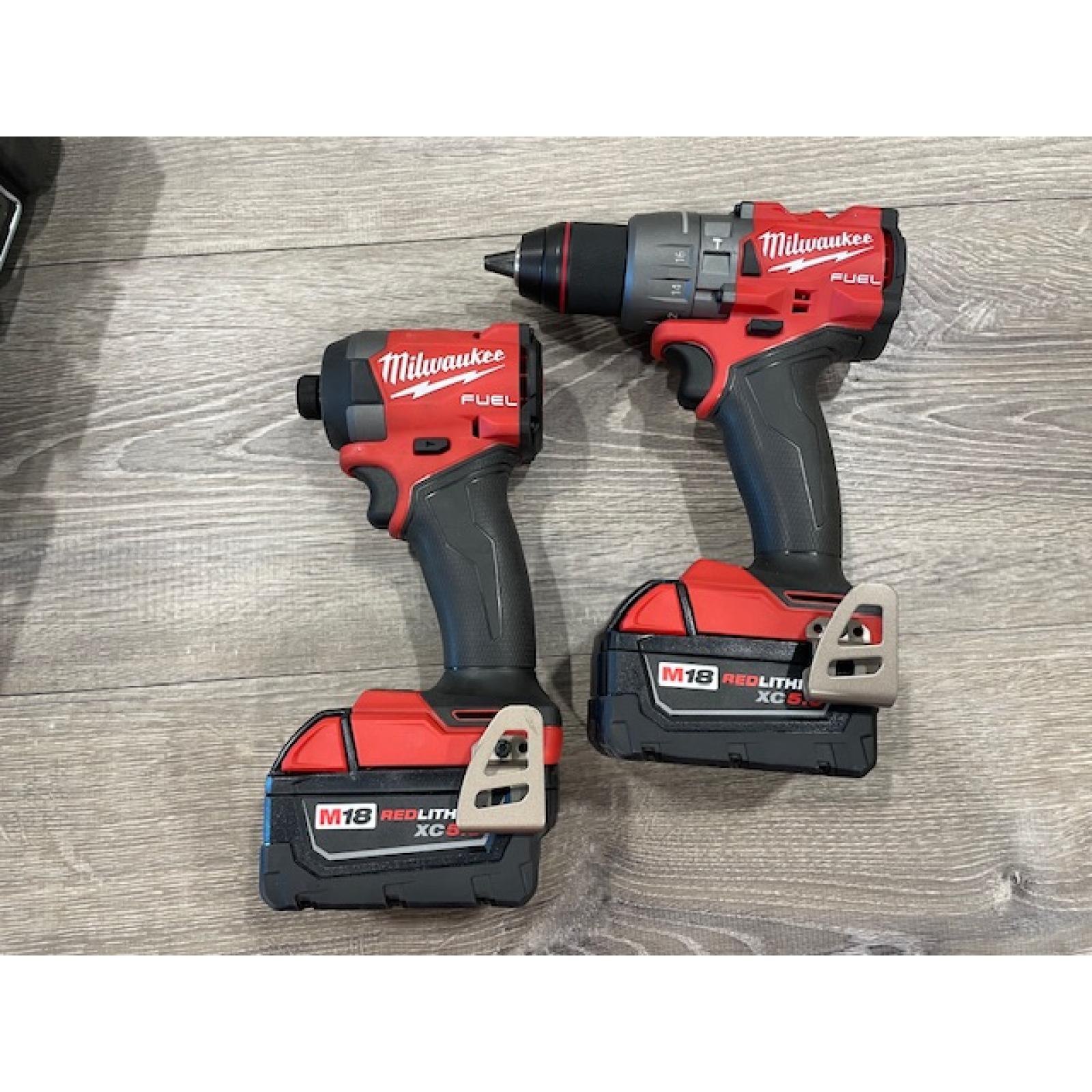 AS-IS Milwaukee FUEL 18V Lithium-Ion Brushless Cordless Hammer Drill and Impact Driver Combo Kit