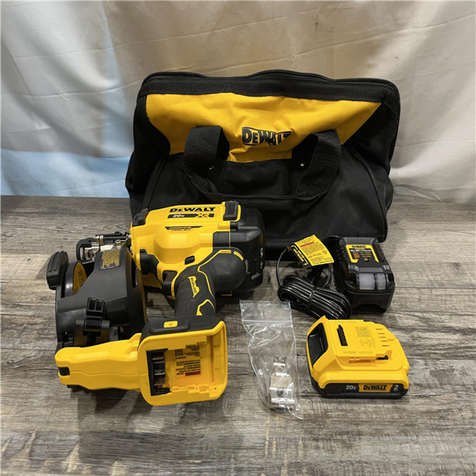 AS-IS DEWALT 20V MAX Lithium-Ion 15-Degree Electric Cordless Roofing Nailer Kit