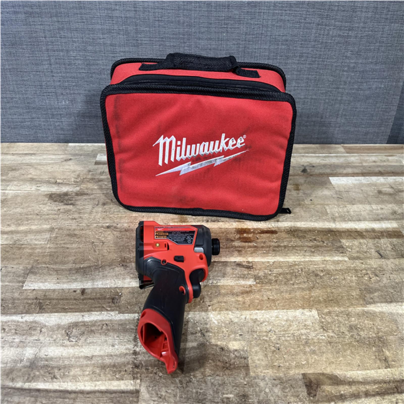 Houston Location AS-IS Milwaukee FUEL 12V Lithium-Ion Brushless Cordless 1/4 in. Hex Impact Driver (Tool-Only)