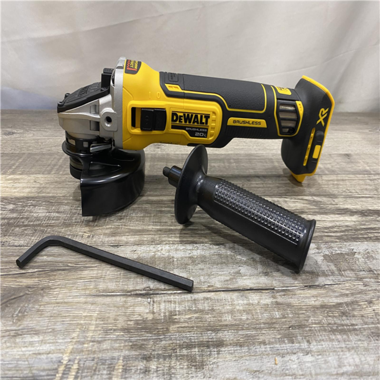 AS-IS DEWALT 20V MAX XR Cordless Brushless 4.5 in. Slide Switch Small Angle Grinder with Kickback Brake (Tool Only)