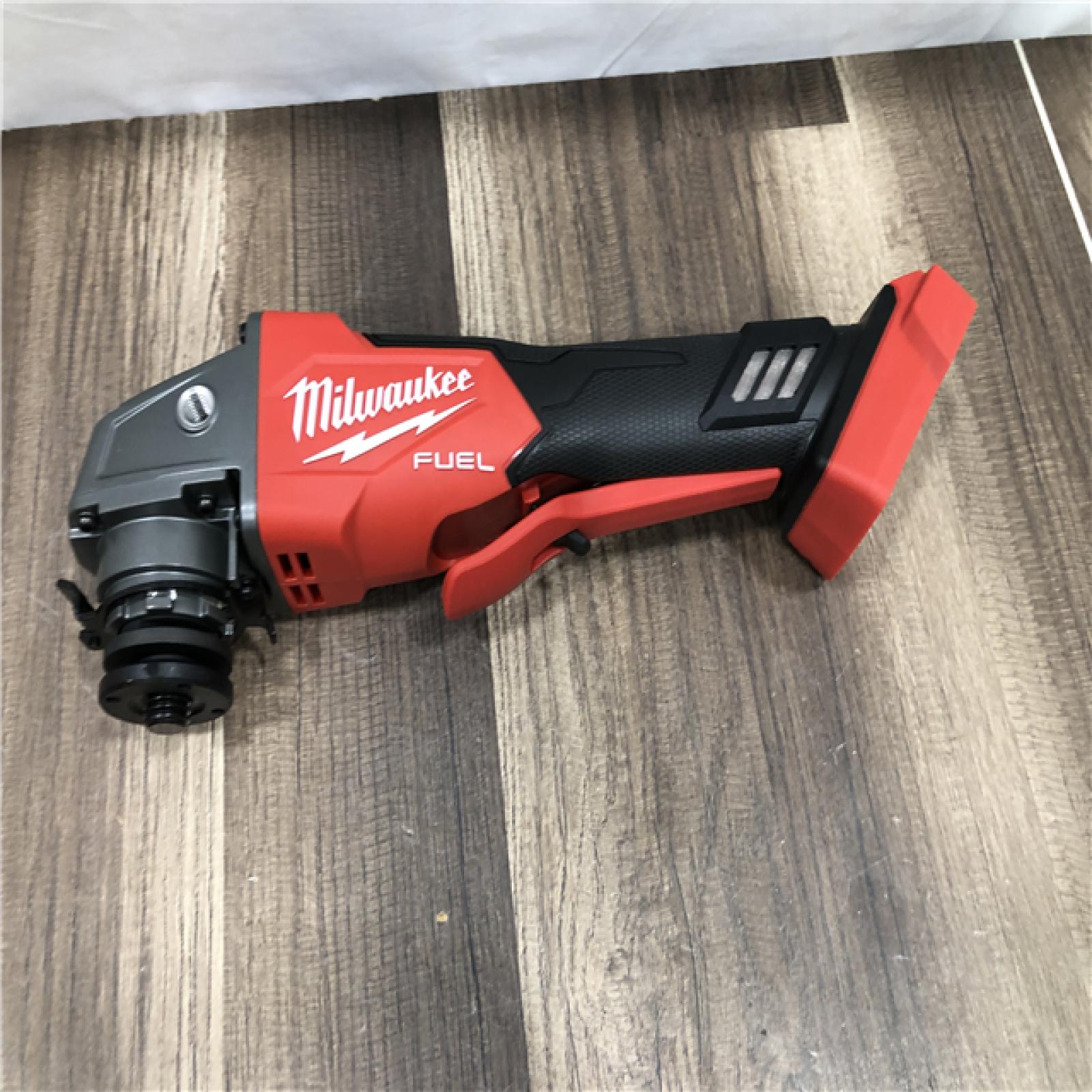 AS-IS Milwaukee FUEL 18V Lithium-Ion Brushless Cordless 4-1/2 in./5 in. Grinder with Variable Speed & Paddle Switch (Tool-Only)