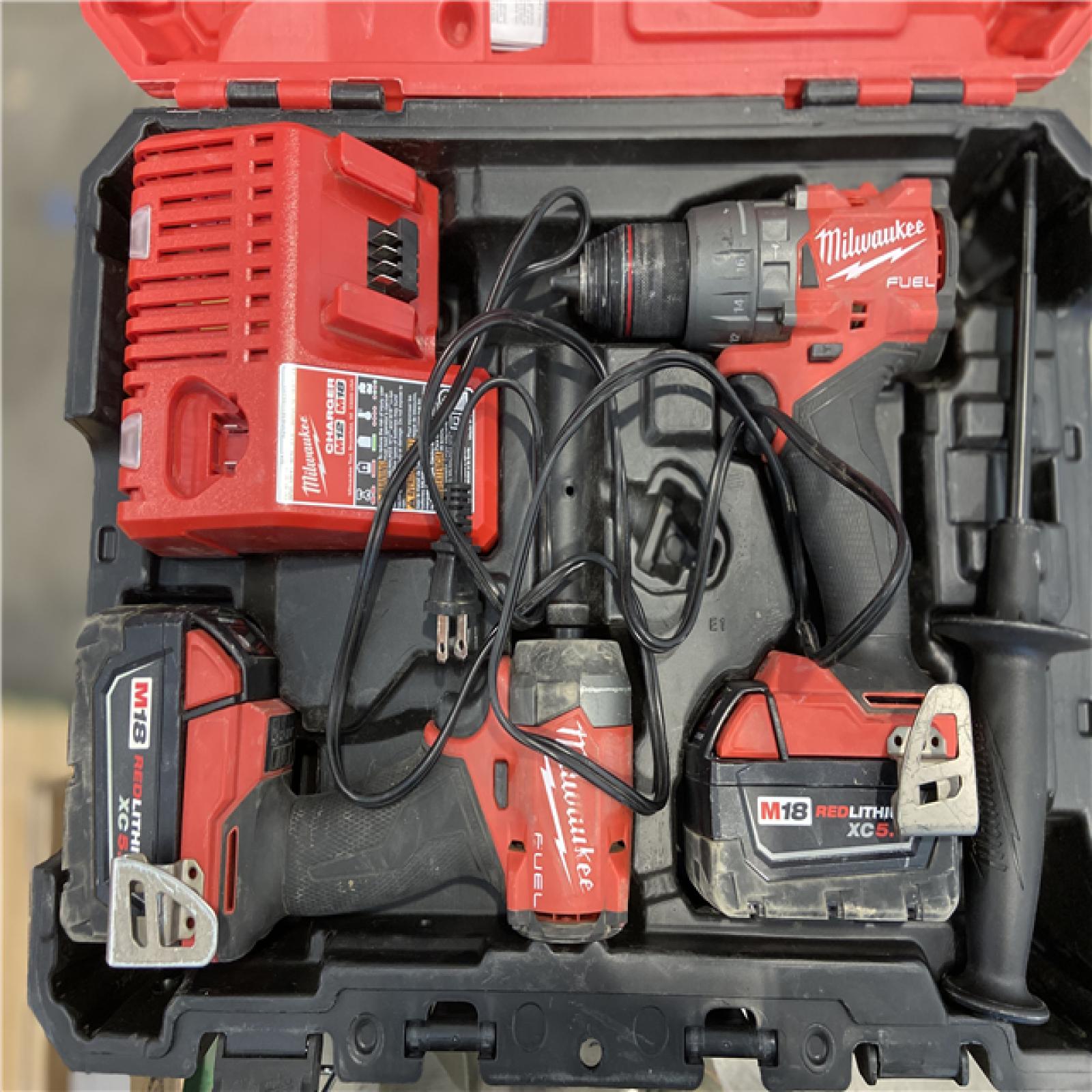 AS-IS - Milwaukee M18 FUEL 18V Lithium-Ion Brushless Cordless Hammer Drill and Impact Driver Combo Kit (2-Tool) with 2 Batteries