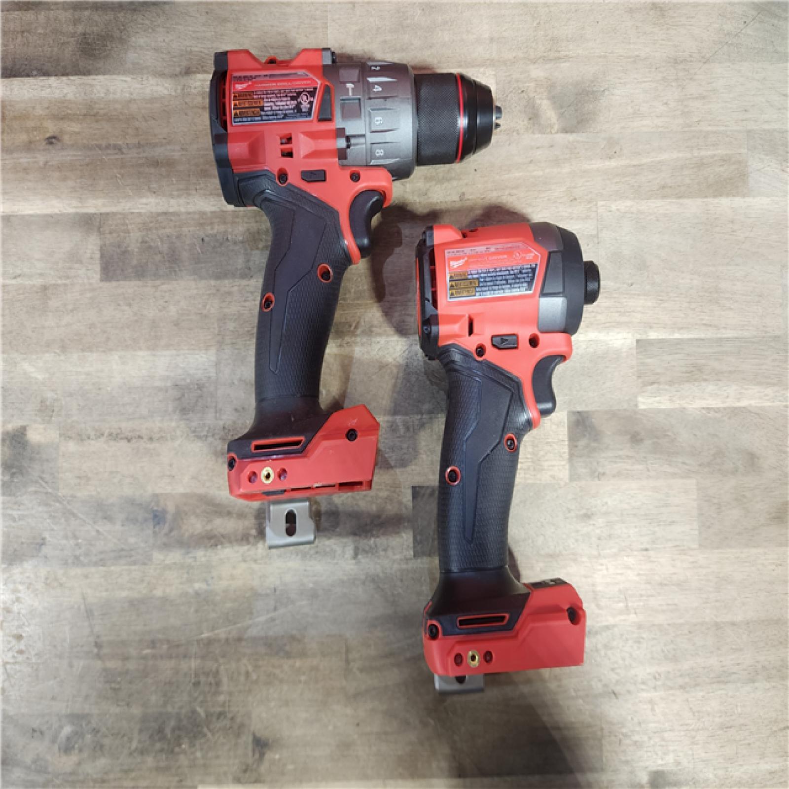 HOUSTON LOCATION - AS-IS (APPEARS LIKE NEW) MILWAUKEE FUEL 18V Lithium-Ion Brushless Cordless Hammer Drill and Impact Driver Combo Kit (2-Tool) with 2 Batteries