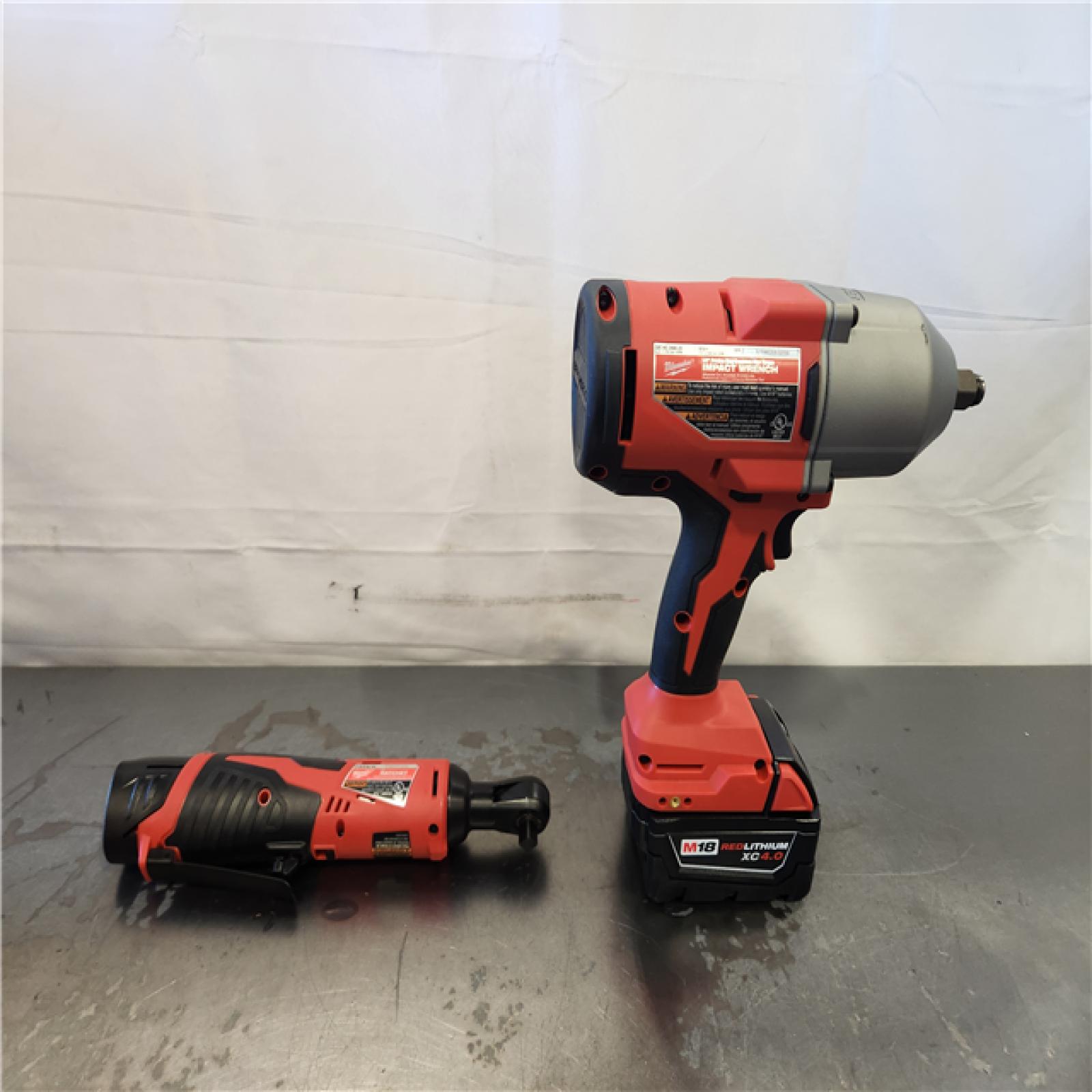 AS-IS- Milwaukee 12/18V Lithium-Ion Cordless 3/8 in. Ratchet and 1/2 in. High Torque Impact Wrench with Friction Ring Combo Kit