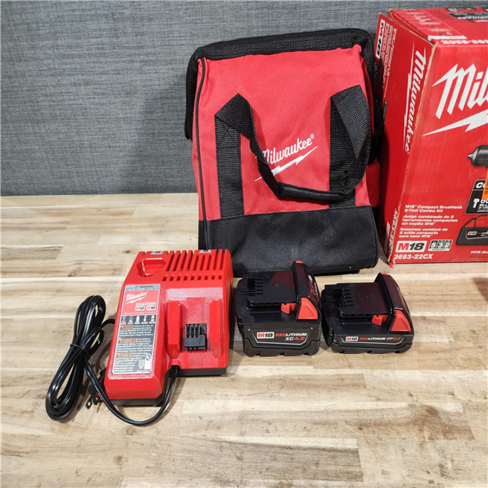 HOUSTON LOCATION - AS-IS Milwaukee 18-Volt Lithium-Ion Brushless Cordless Compact Hammer Drill/Impact Combo Kit