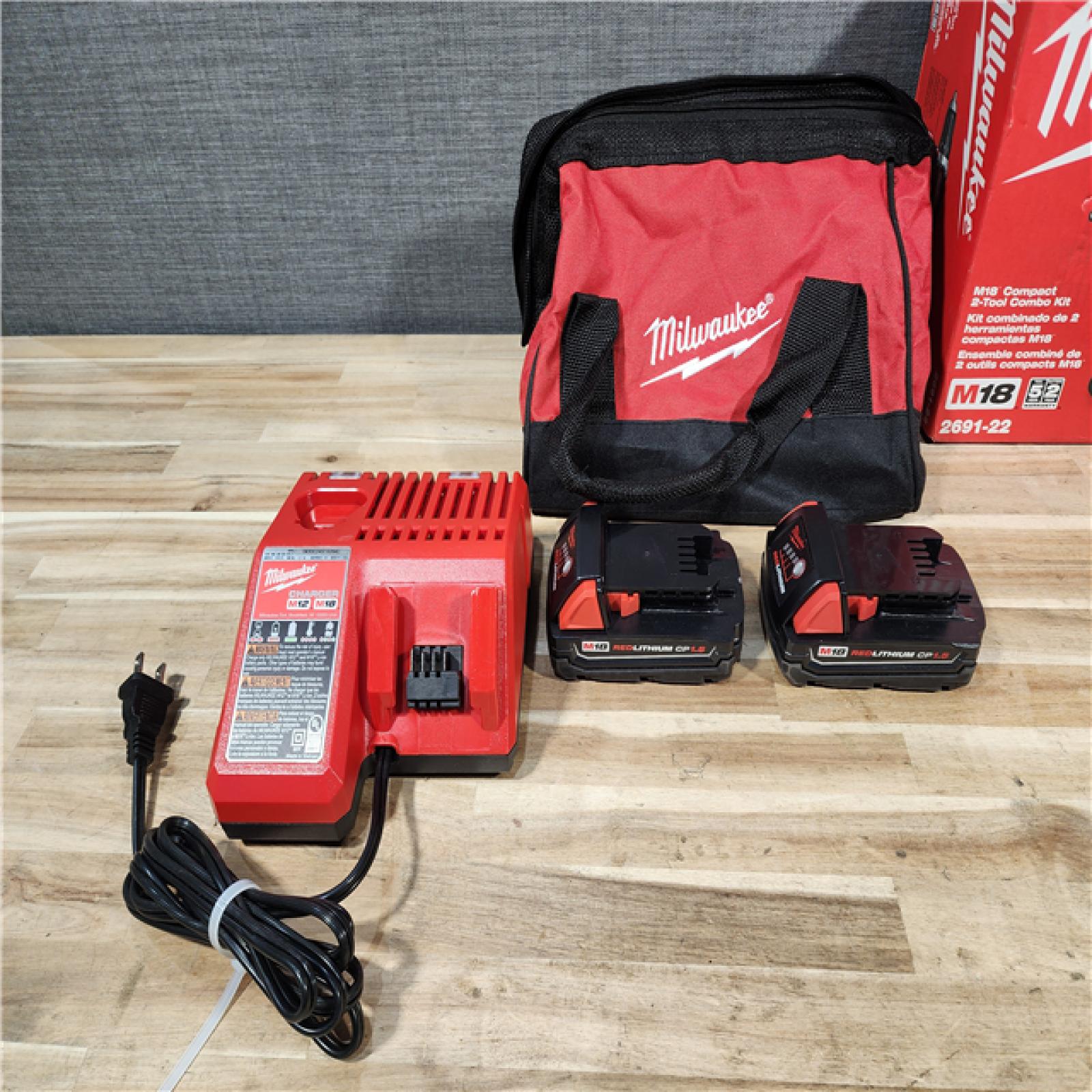 HOUSTON LOCATION - AS-IS Milwaukee 18V Lithium-Ion Cordless Drill Driver/Impact Driver Combo Kit