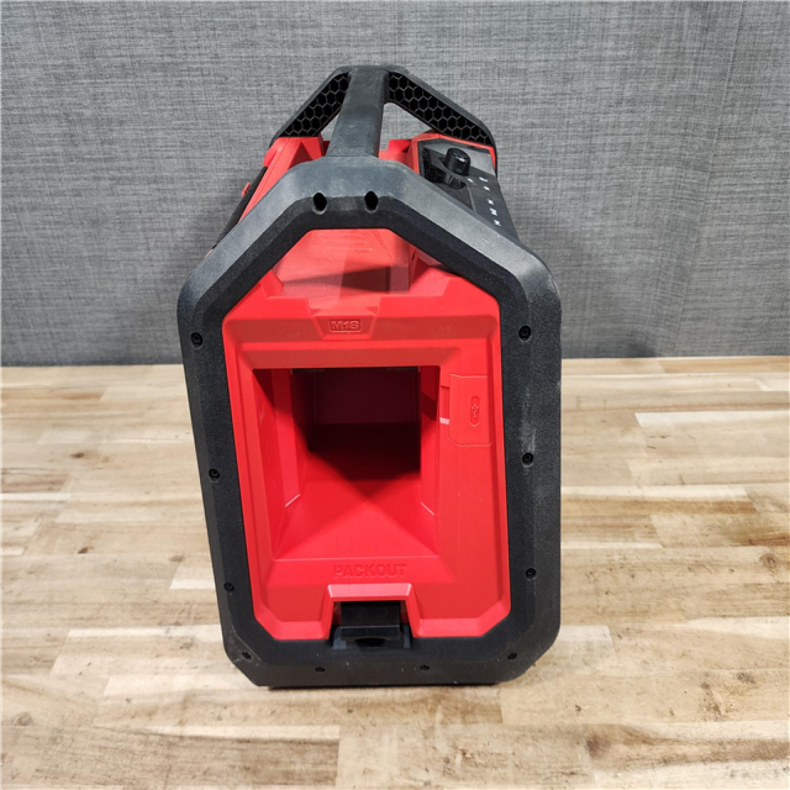 HOUSTON LOCATION - AS-IS MILWAUKEE BLUETOOTH JOBSITE RADIO + CHARGER