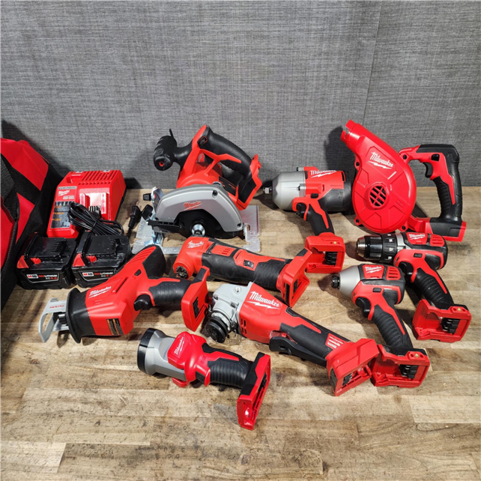 HOUSTON LOCATION - AS-IS Milwaukee M18 18-Volt Lithium-Ion Cordless Combo Kit (9-Tool) with (2) Batteries  Charger  and Tool Bag
