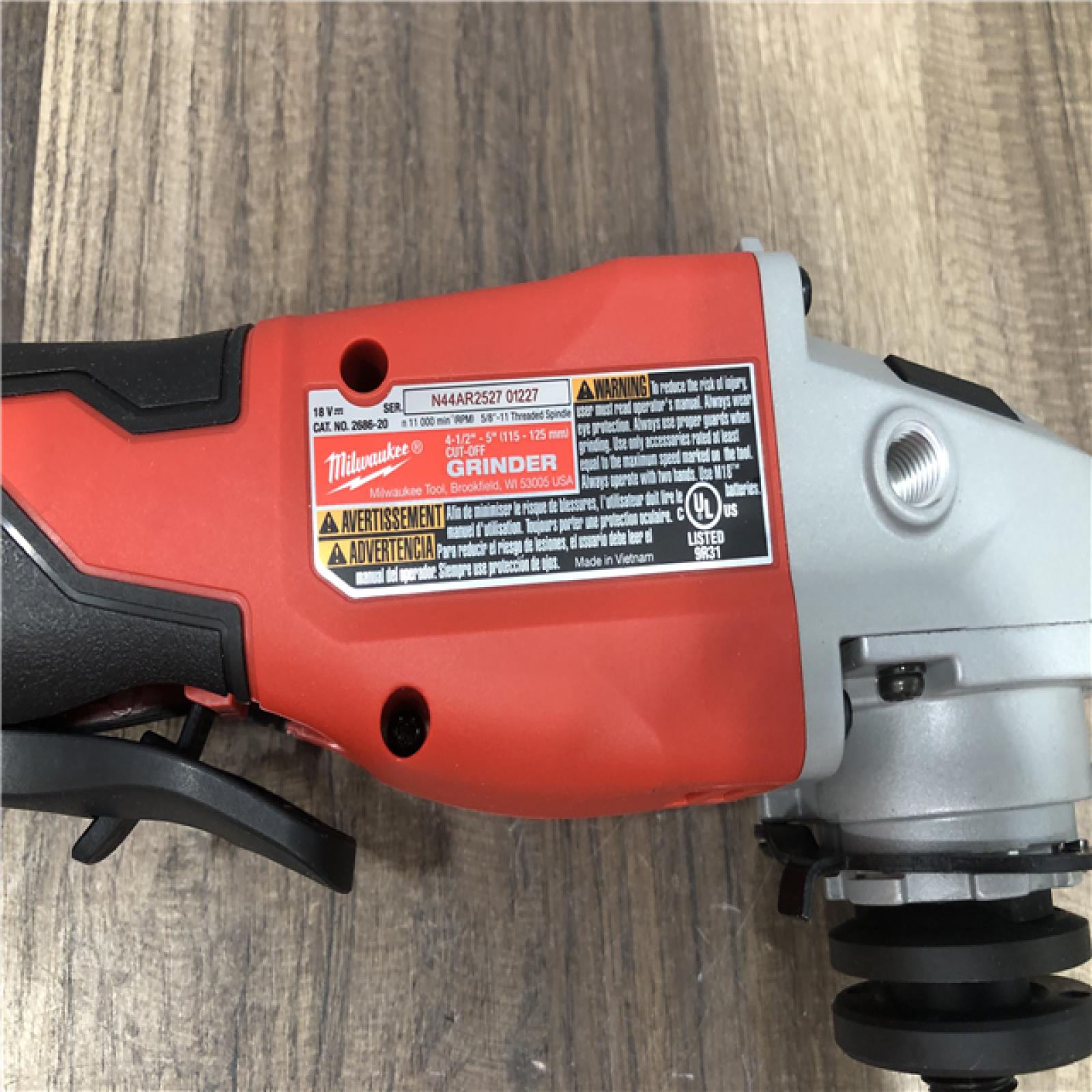 AS-IS Milwaukee 18V Lithium-Ion Brushless Cordless 4-1/2 in./5 in. Grinder w/Paddle Switch (Tool-Only)