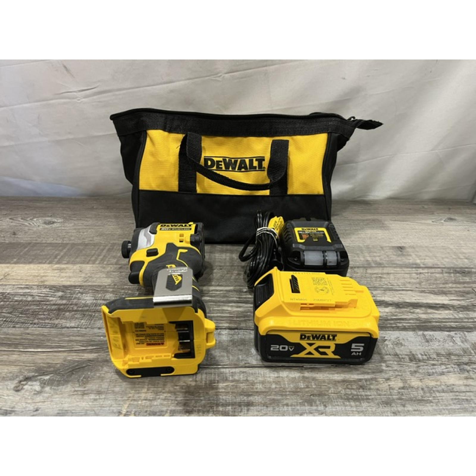 AS-IS DEWALT ATOMIC 20V MAX Lithium-Ion Cordless 1/4 in. Brushless Impact Driver Kit