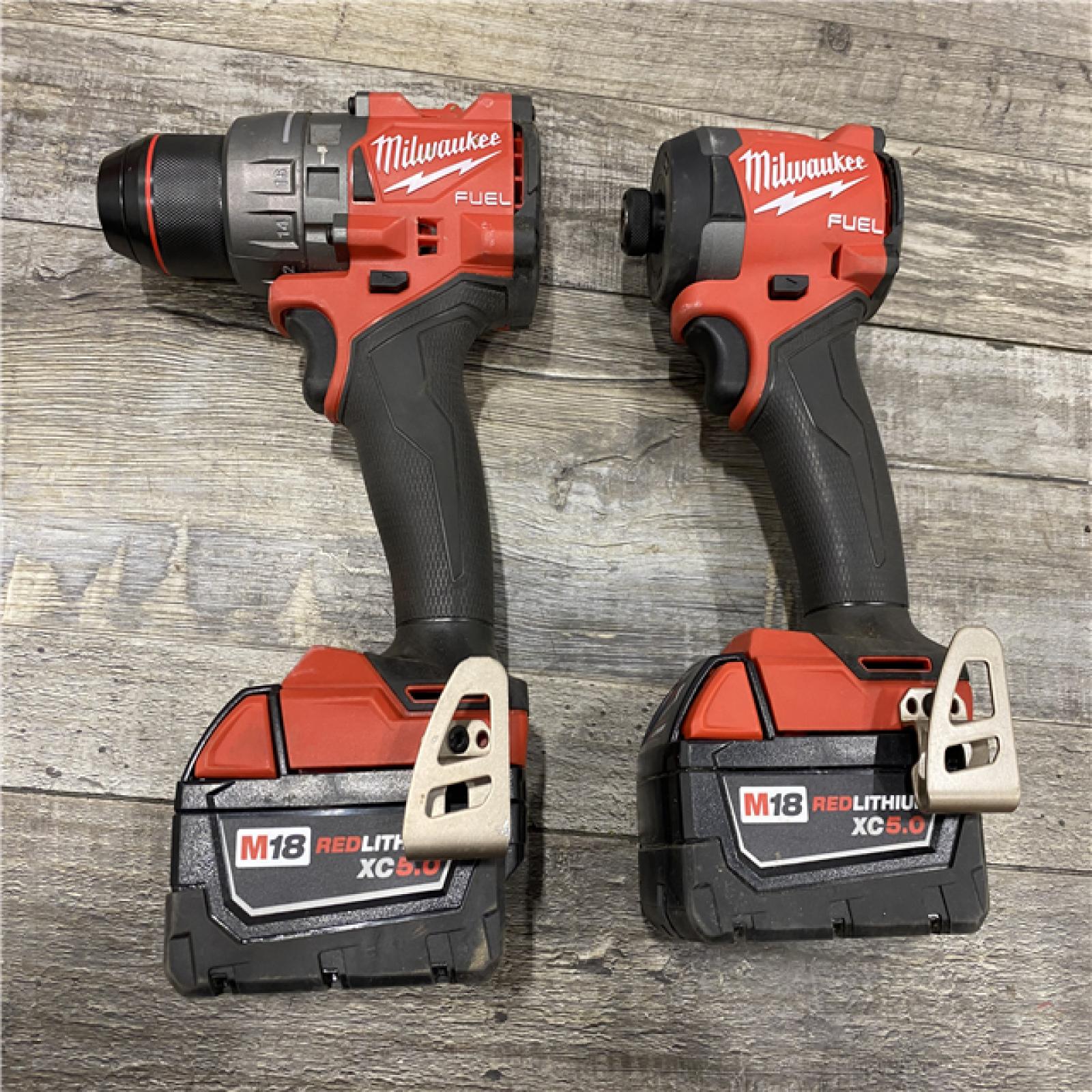 AS-IS Milwaukee FUEL 18V Lithium-Ion Brushless Cordless Hammer Drill and Impact Driver Combo Kit