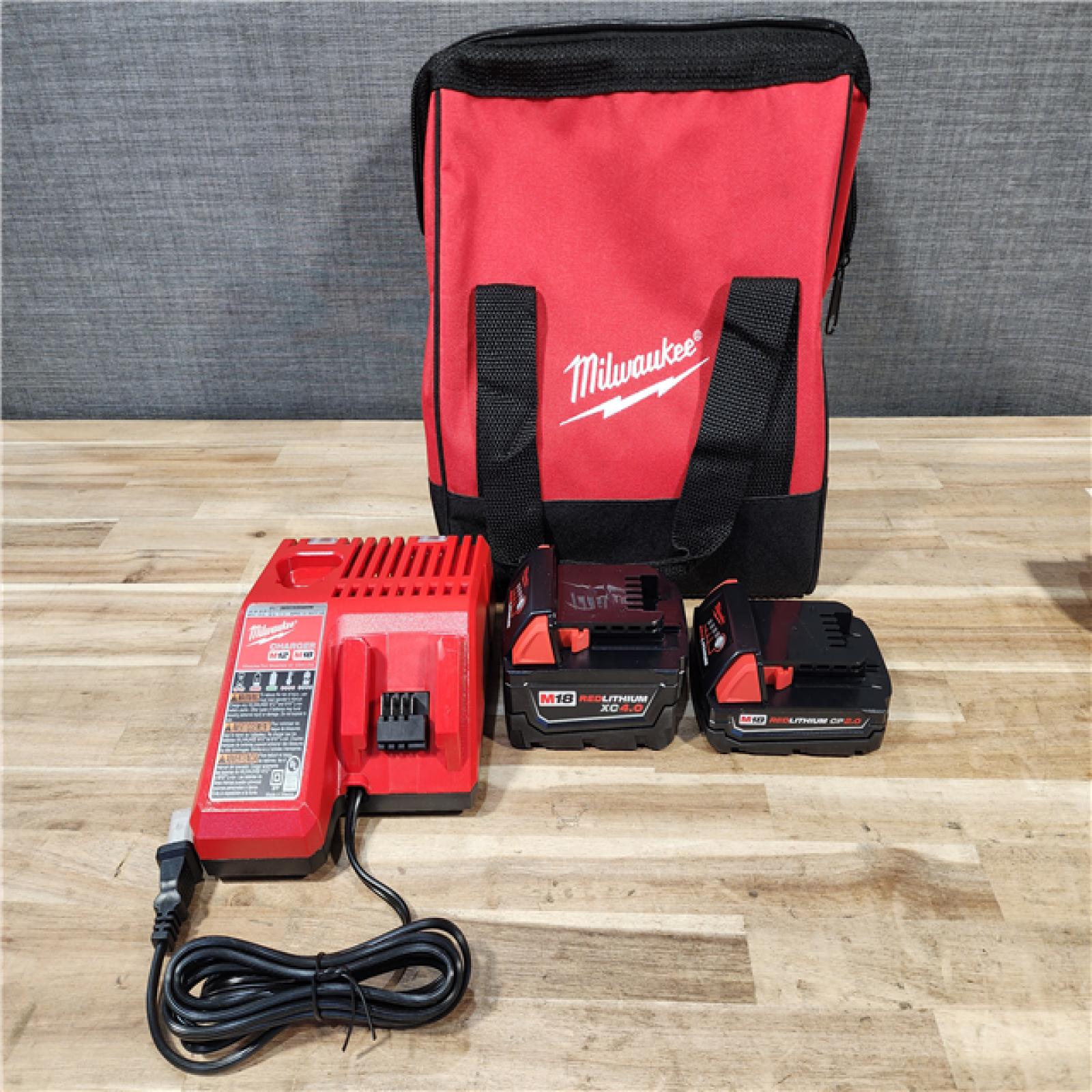 HOUSTON LOCATION - AS-IS Milwaukee 18-Volt Lithium-Ion Brushless Cordless Compact Hammer Drill/Impact Combo Kit