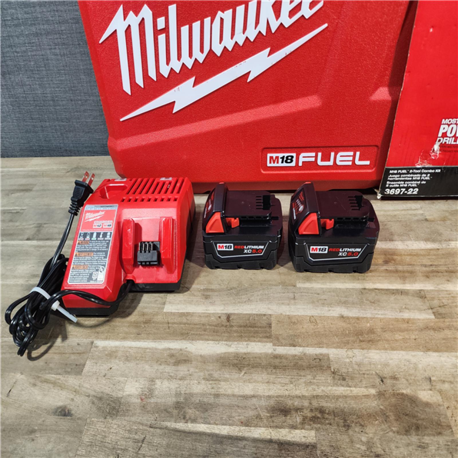 HOUSTON LOCATION - AS-IS MILWAUKEE FUEL 18V Lithium-Ion Brushless Cordless Hammer Drill and Impact Driver Combo Kit