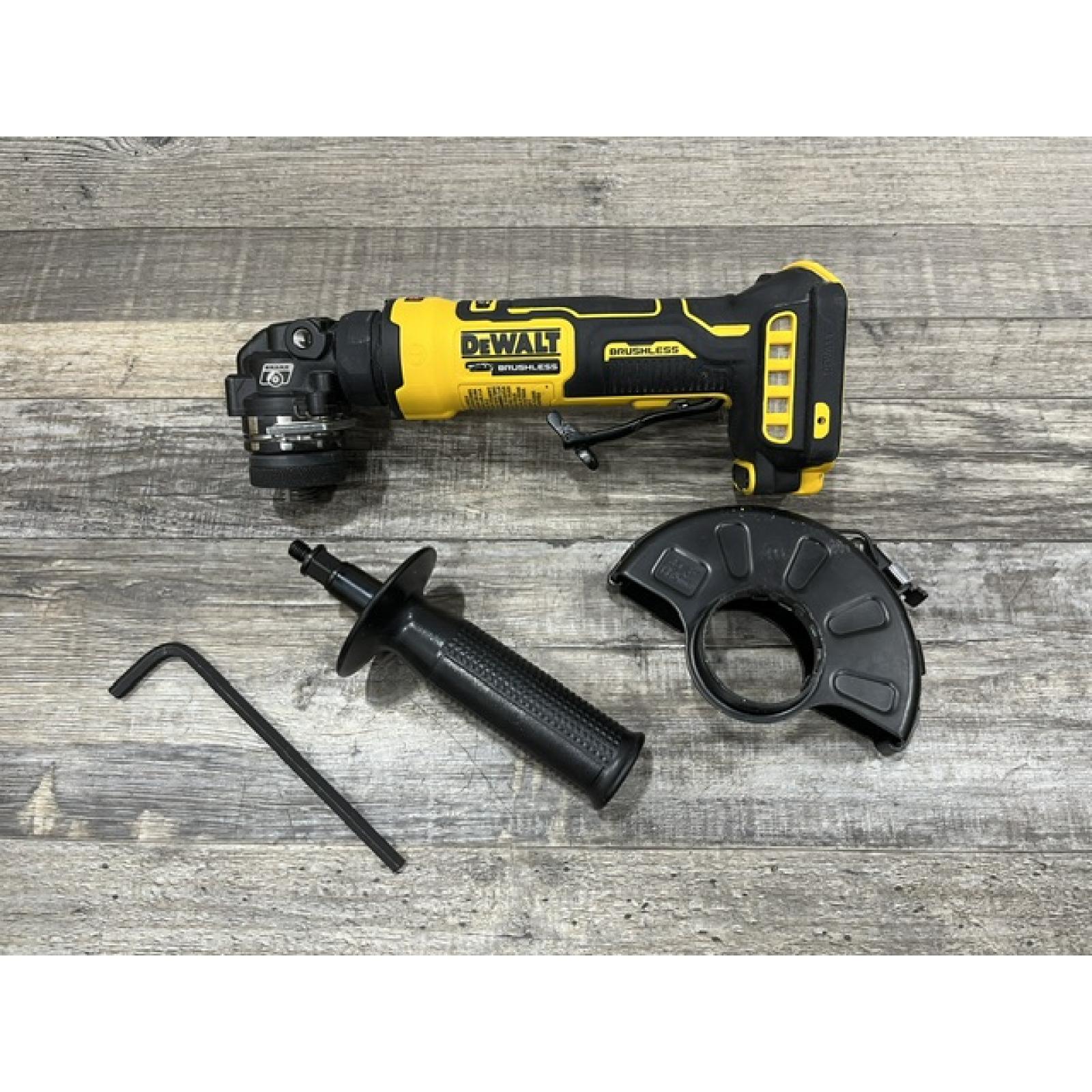 AS-IS DEWALT ATOMIC 20V MAX Cordless 4-1/2 in. Angle Grinder with Paddle Switch (Tool Only)