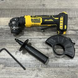 AS-IS DEWALT ATOMIC 20V MAX Cordless 4-1/2 in. Angle Grinder with Paddle Switch (Tool Only)