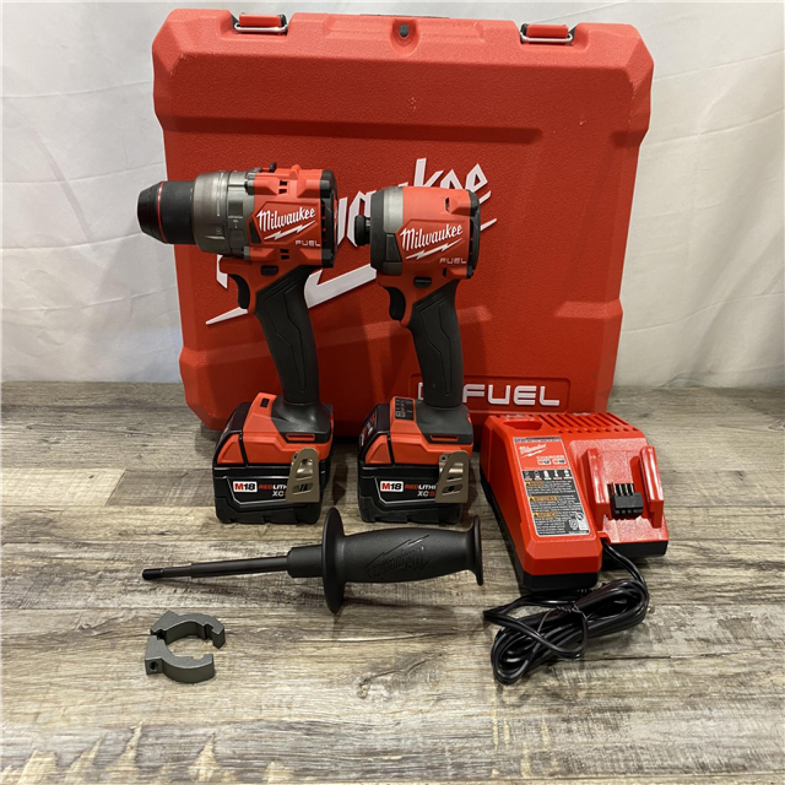 AS-IS Milwaukee FUEL 18V Lithium-Ion Brushless Cordless Hammer Drill and Impact Driver Combo Kit