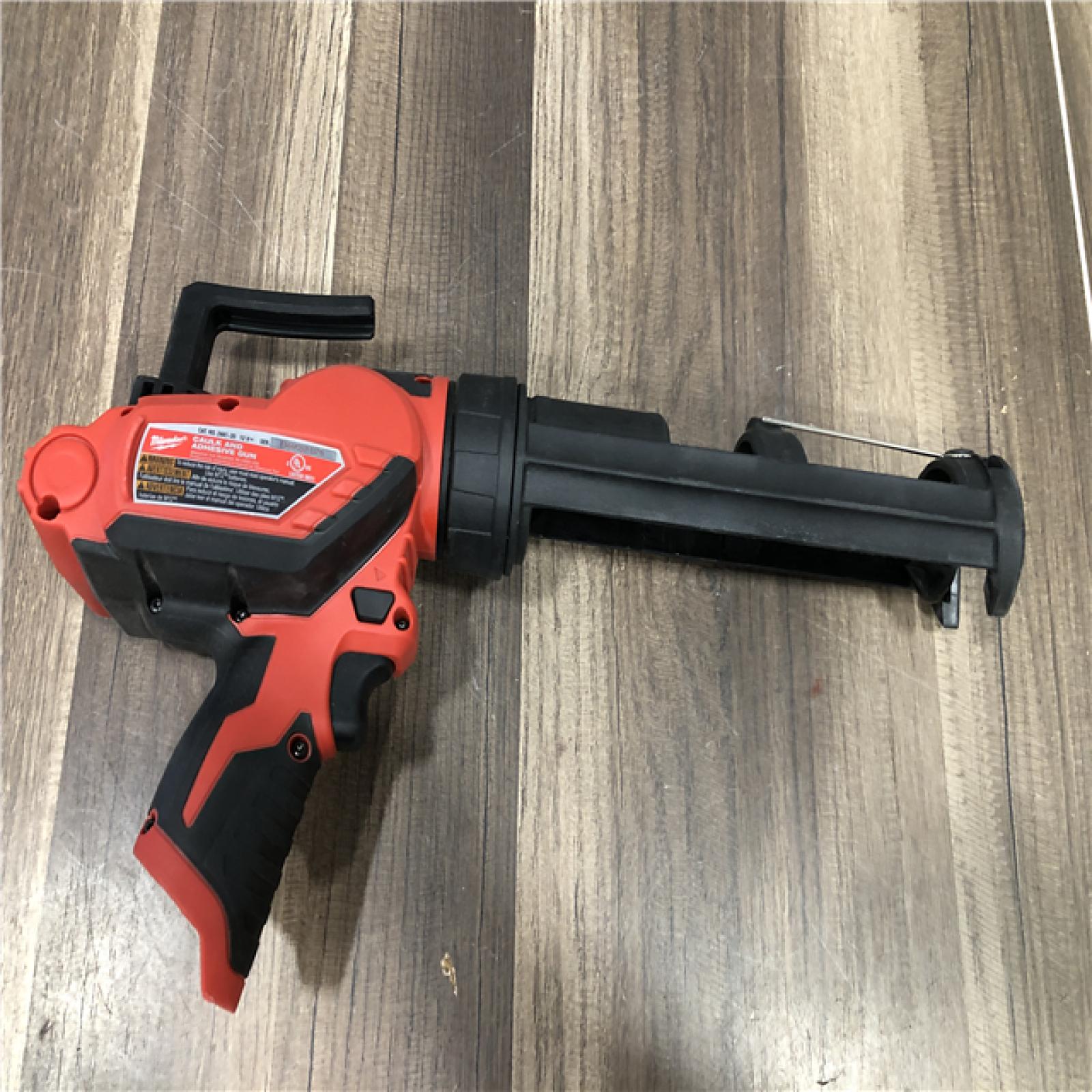 AS-IS Milwaukee  12V Lithium-Ion Cordless 10 oz. Adhesive and Caulk Gun (Tool-Only)