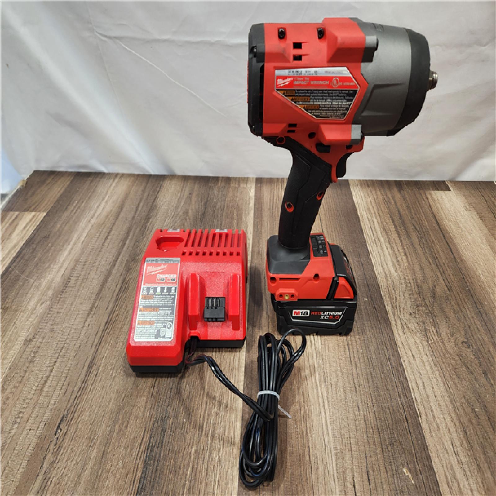 AS-IS- Milwaukee M18 1/2 in. Cordless Brushless High Torque Impact Wrench Kit (Battery & Charger)