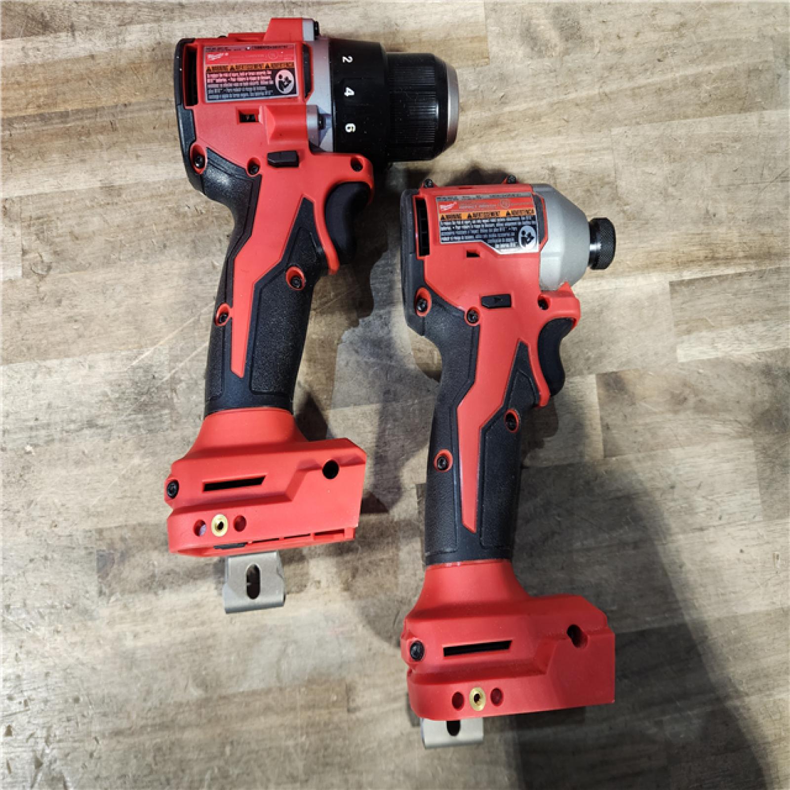 HOUSTON LOCATION - AS-IS Milwaukee M18 18V Lithium-Ion Brushless Cordless Compact Drill/Impact Combo Kit (2-Tool) W/(2) 2.0 Ah Batteries  Charger & Bag