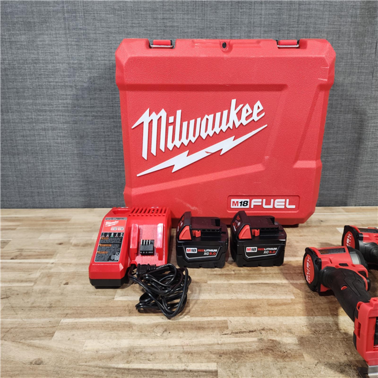 HOUSTON LOCATION - AS - IS Milwaukee FUEL 18V Lithium-Ion Brushless Cordless Hammer Drill and Impact Driver Combo Kit