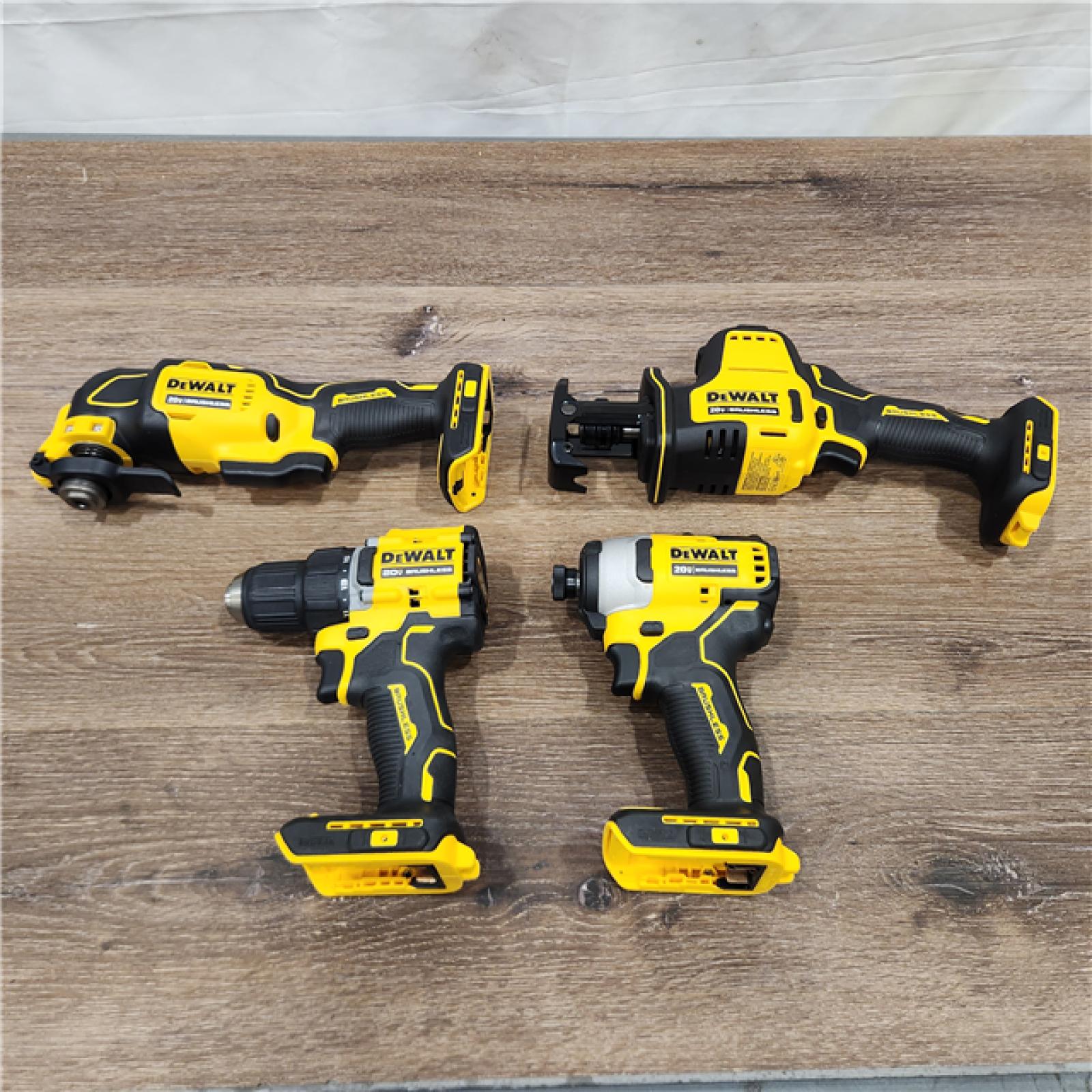 AS-IS DEWALT ATOMIC 20-Volt Lithium-Ion Cordless Brushless Combo Kit (4-Tool) with (2) 2.0Ah Batteries, Charger and Bag